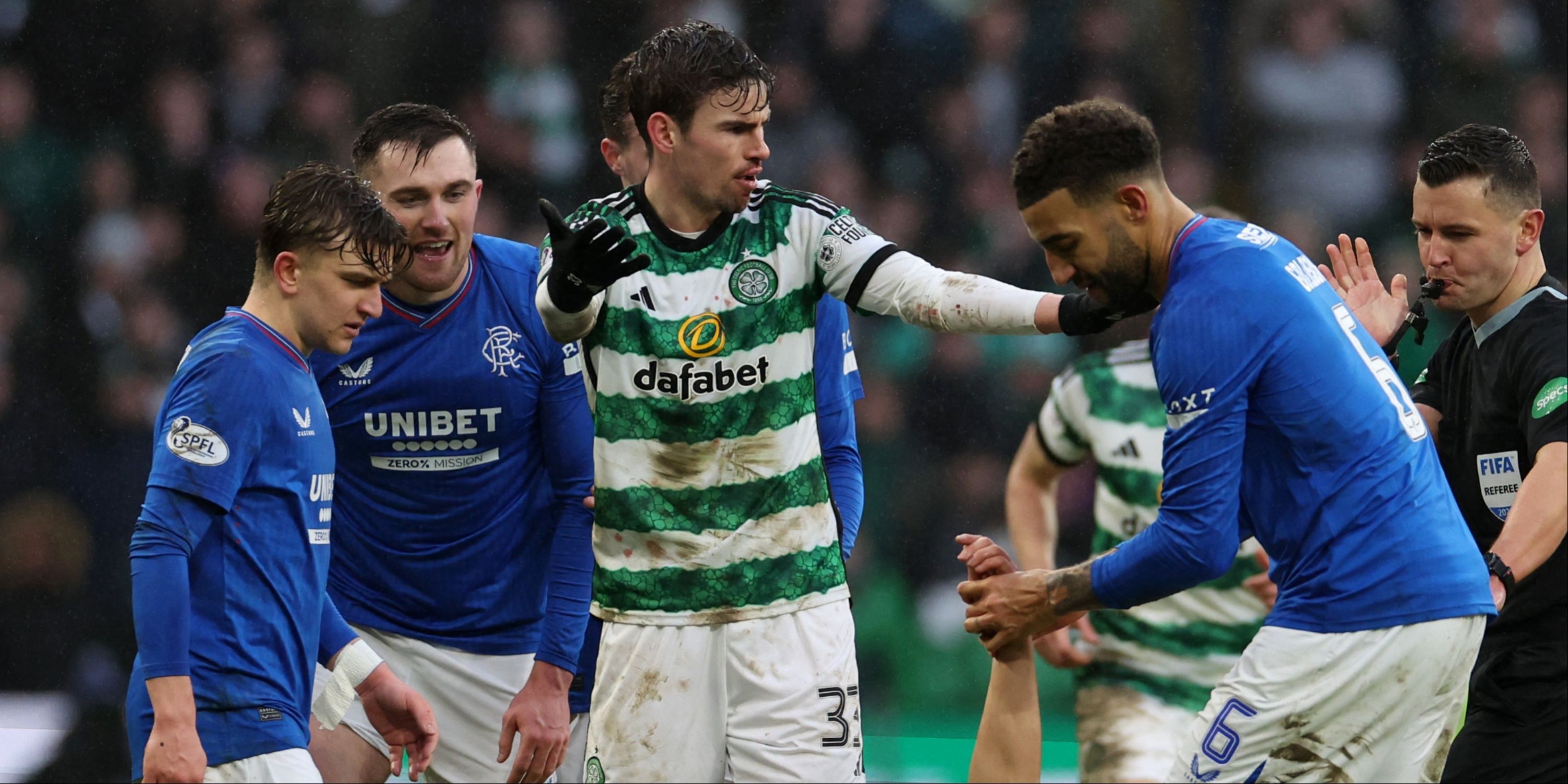 Celtic and Rangers players clash