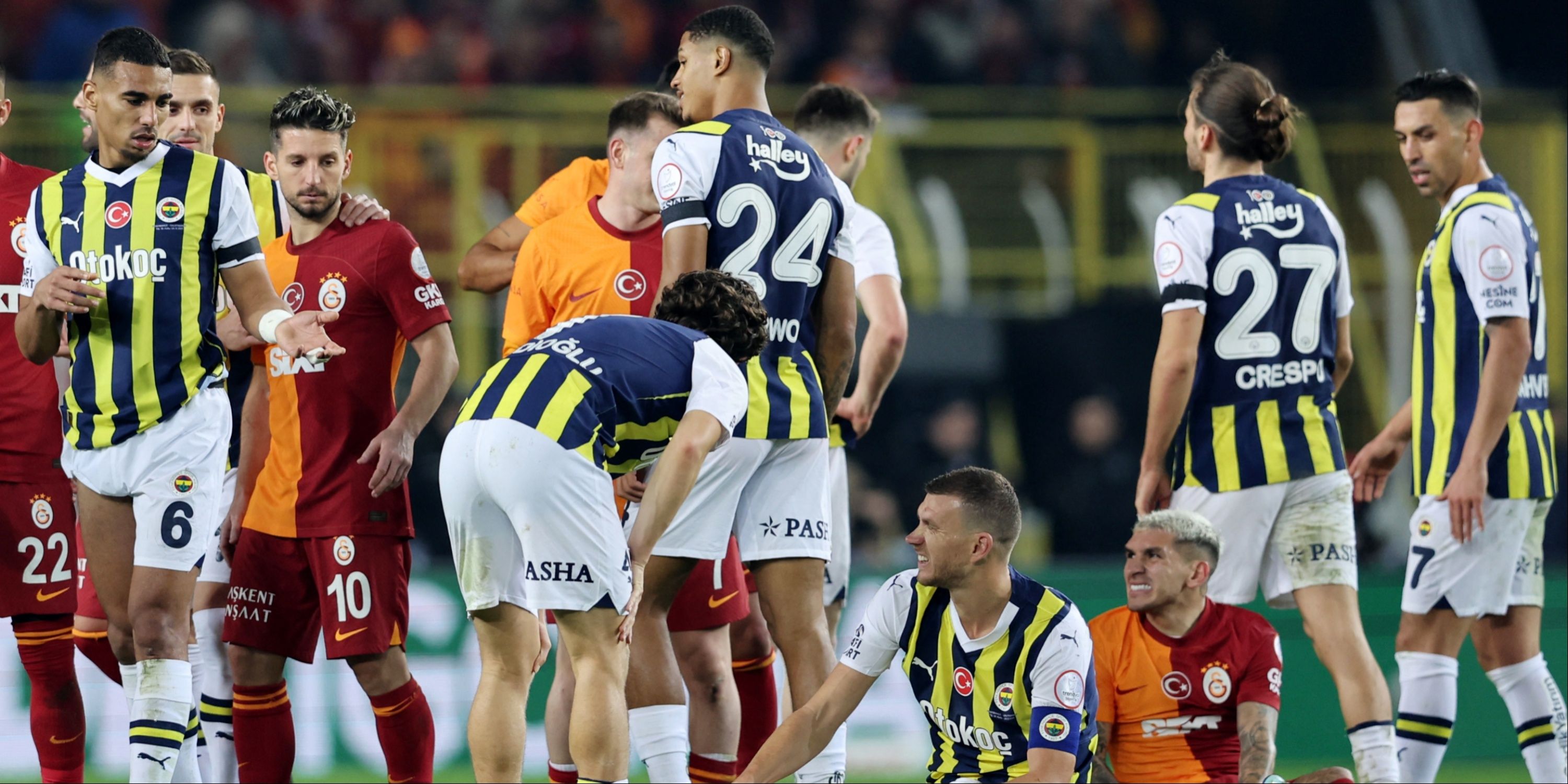 Fenerbahce and Galatasaray players in action