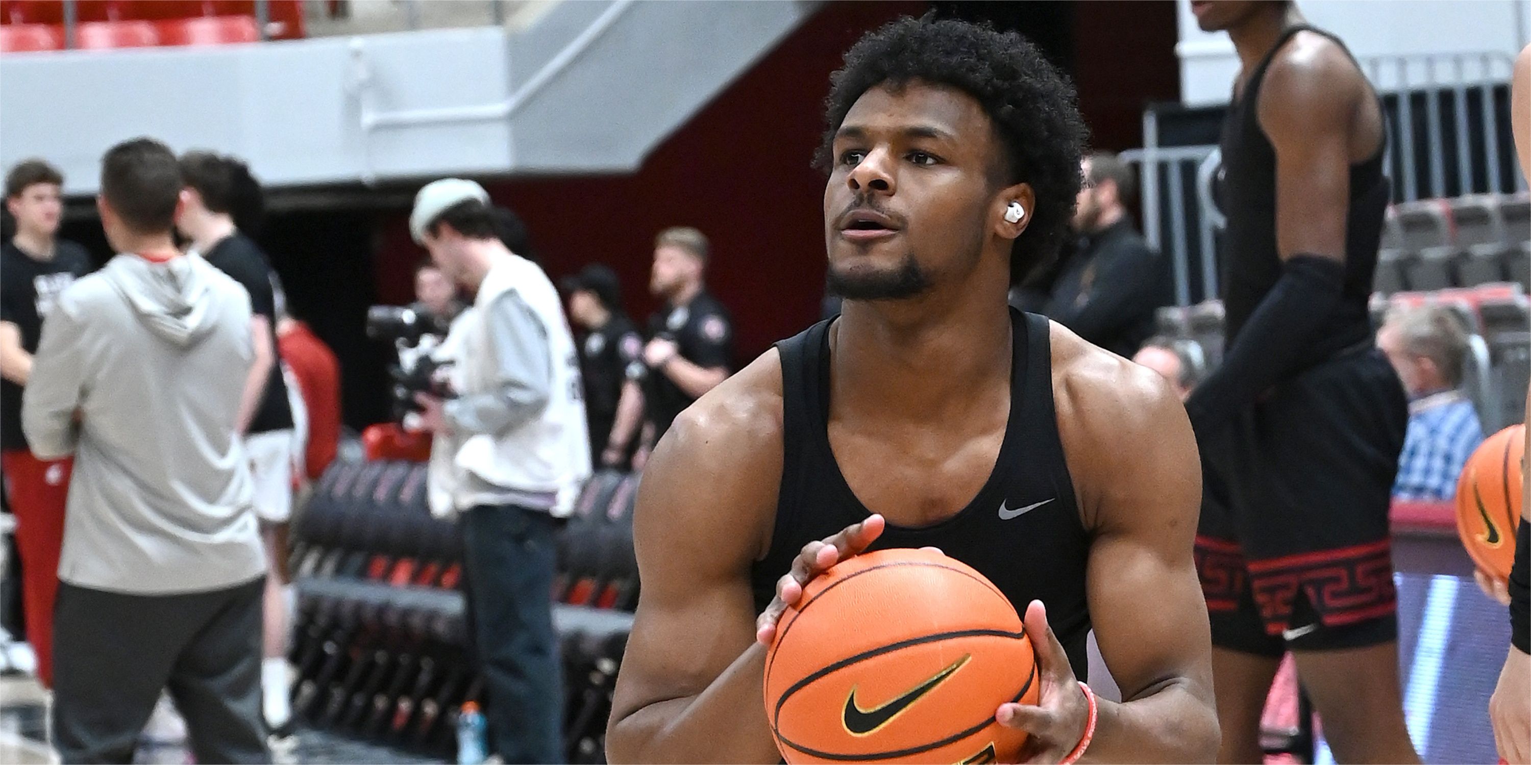 Bronny James shoots ball at practice