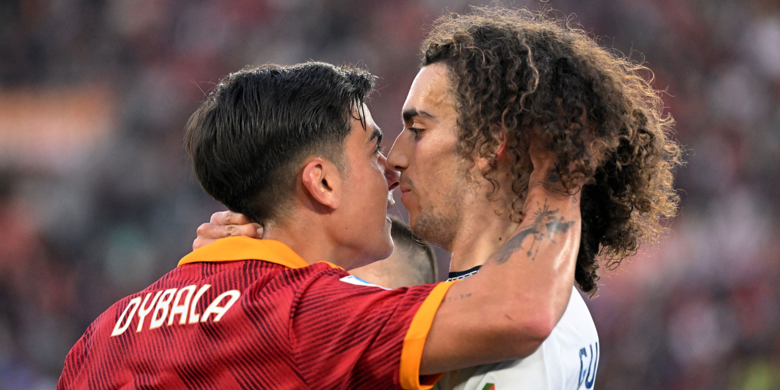 AS Roma's Paulo Dybala clashes with Lazio's Matteo Guendouzi