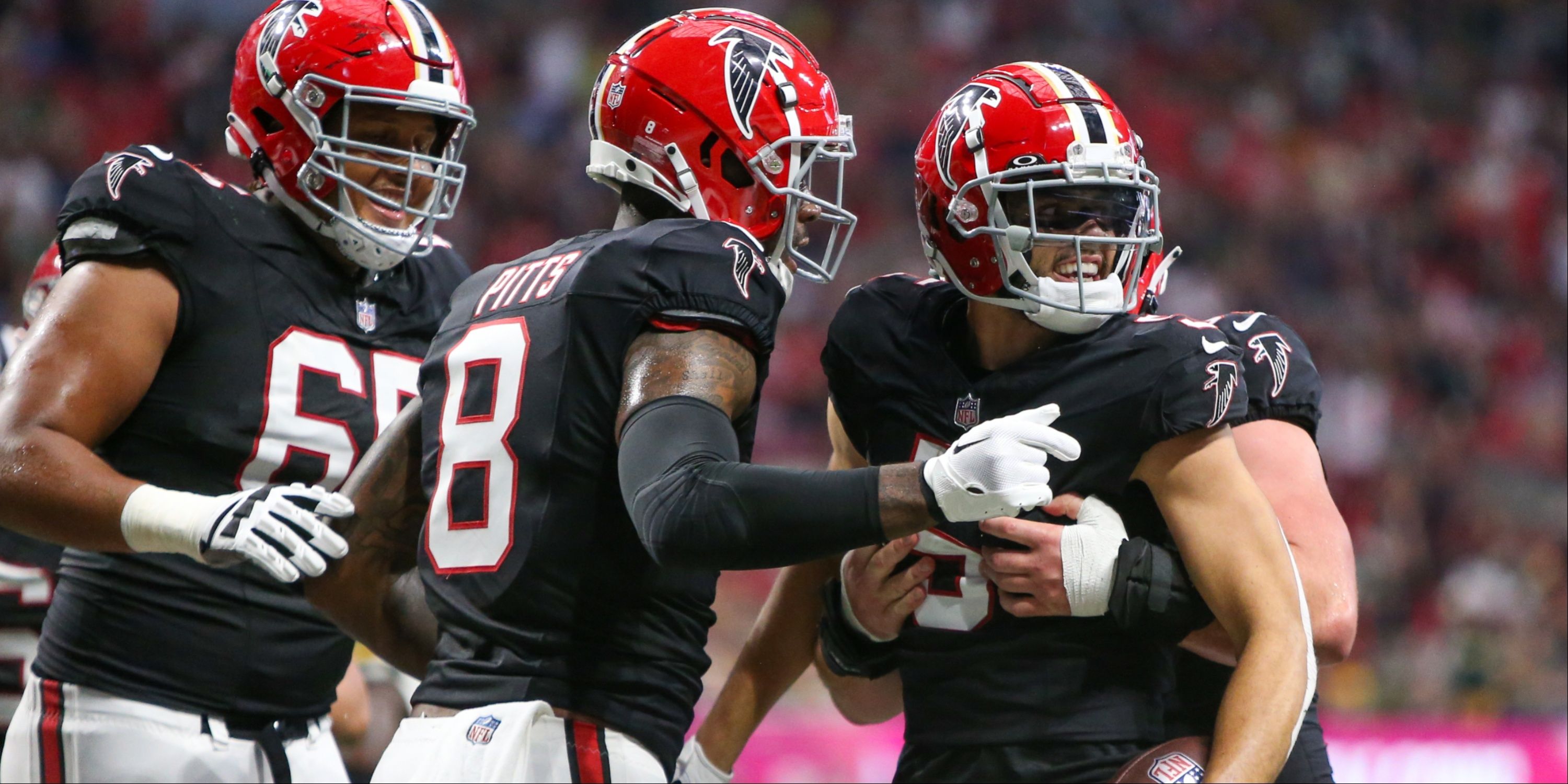 Drake London and Kyle Pitts celebrate a Falcons' touchdown