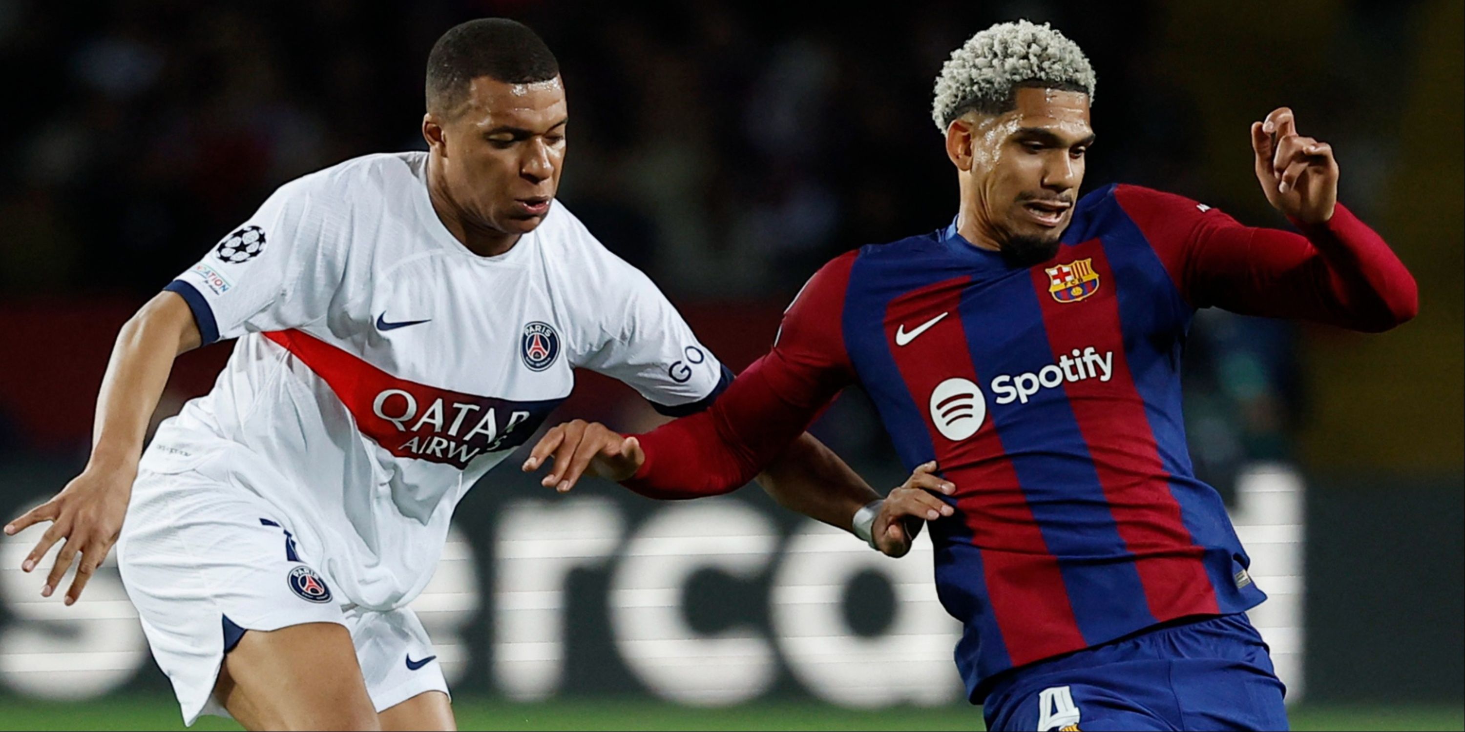 Ronald Araujo and Kylian Mbappe in action in the Champions League