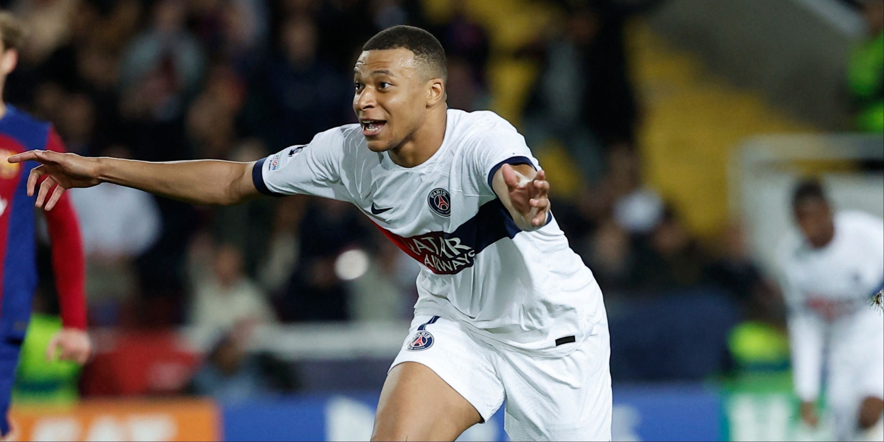 Kylian Mbappe celebrates scoring for PSG