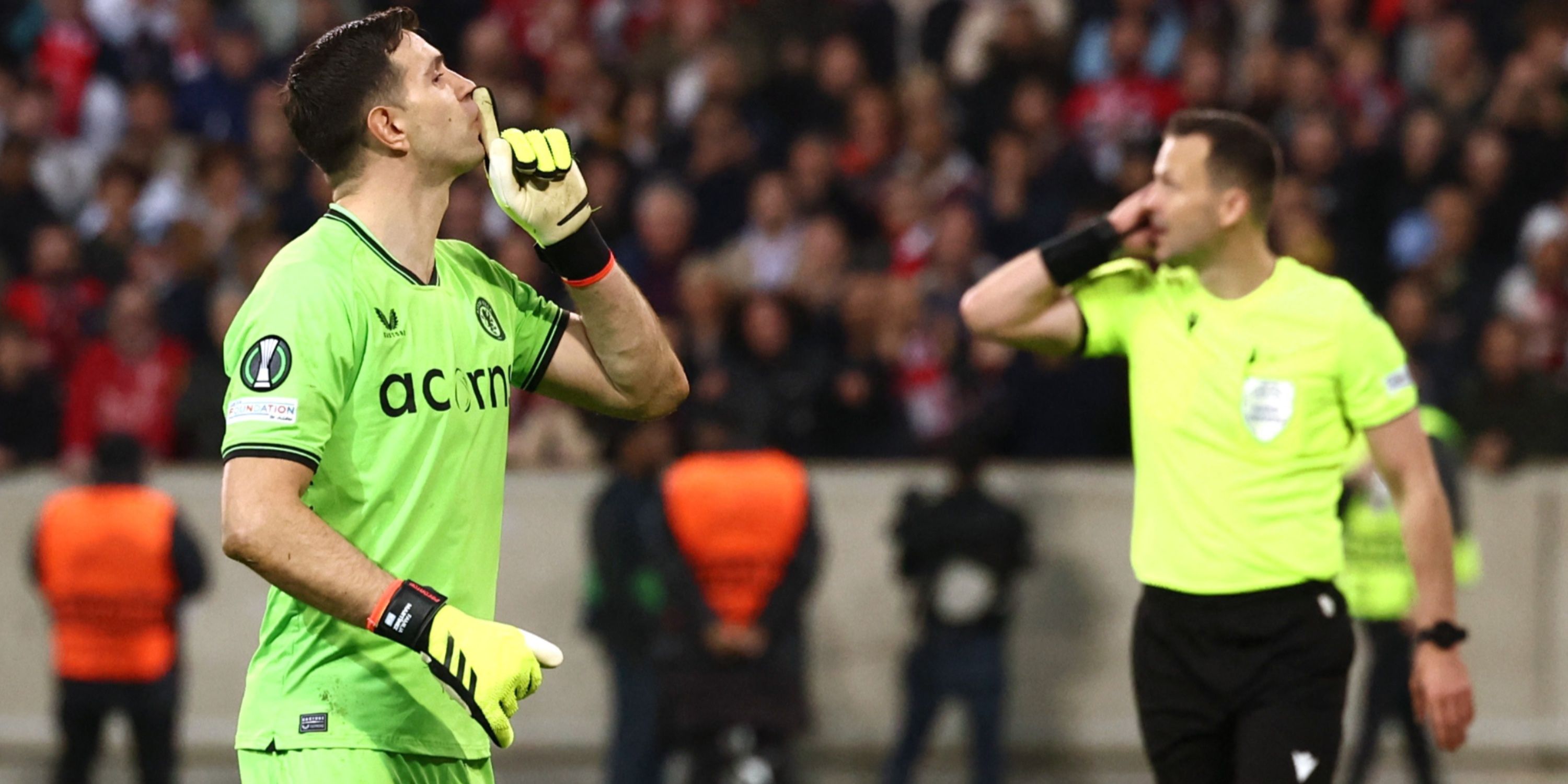 Aston Villa's Emiliano Martinez celebrates saving Lille's Nabil Bentaleb penalty