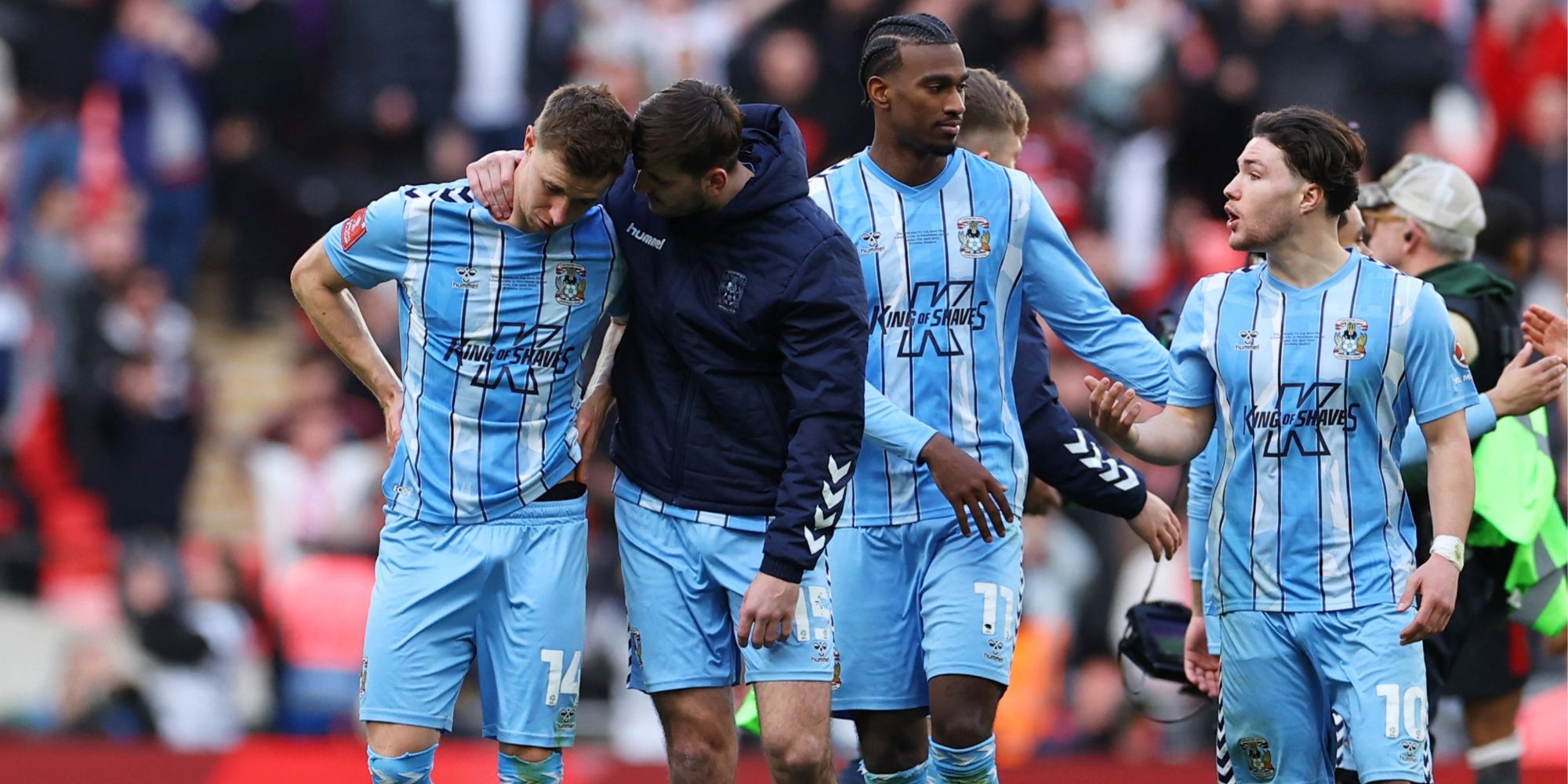 The sadness of Coventry City's players, eliminated on penalties by Manchester United.