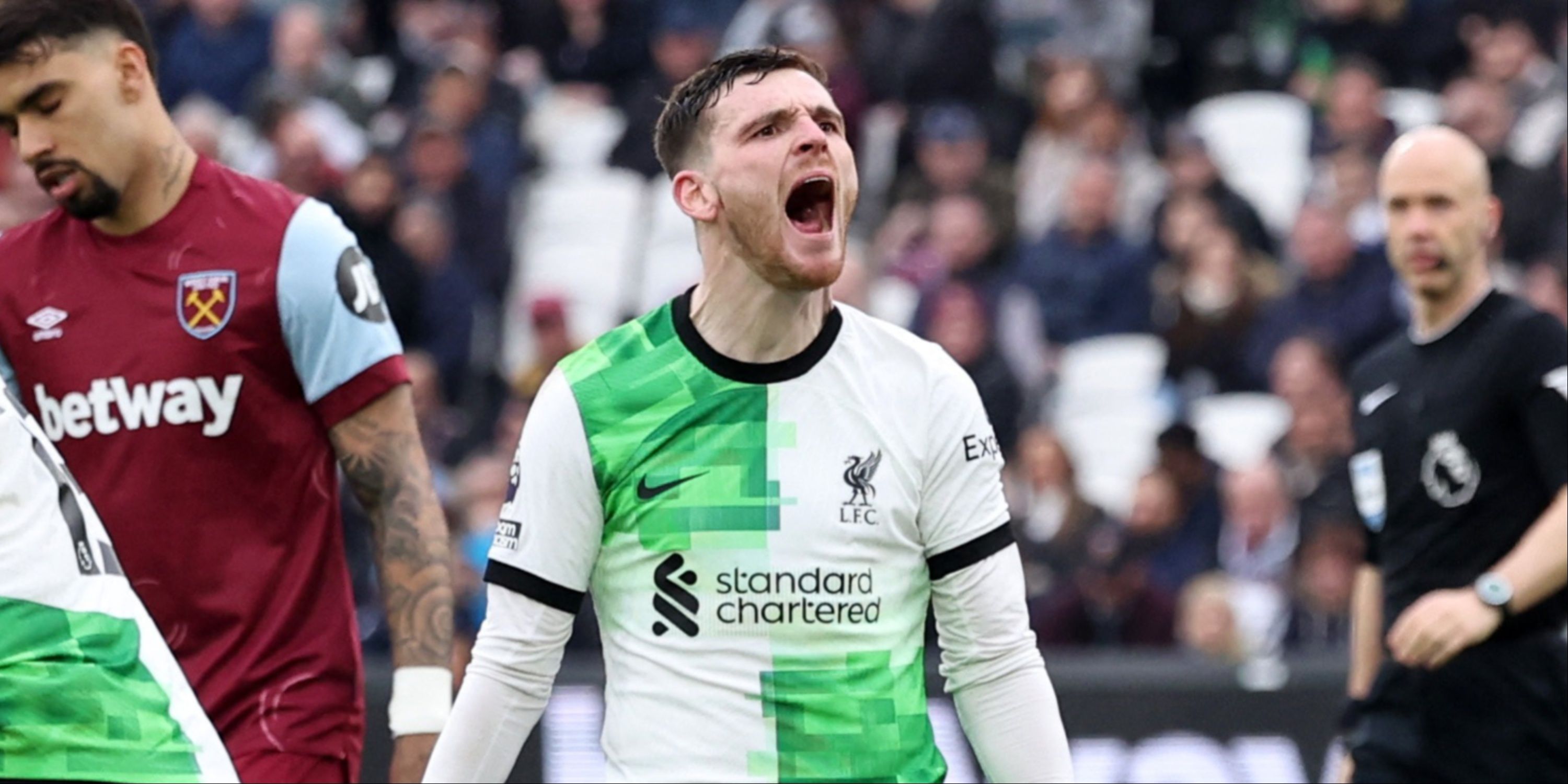 Andy Robertson celebrates for Liverpool