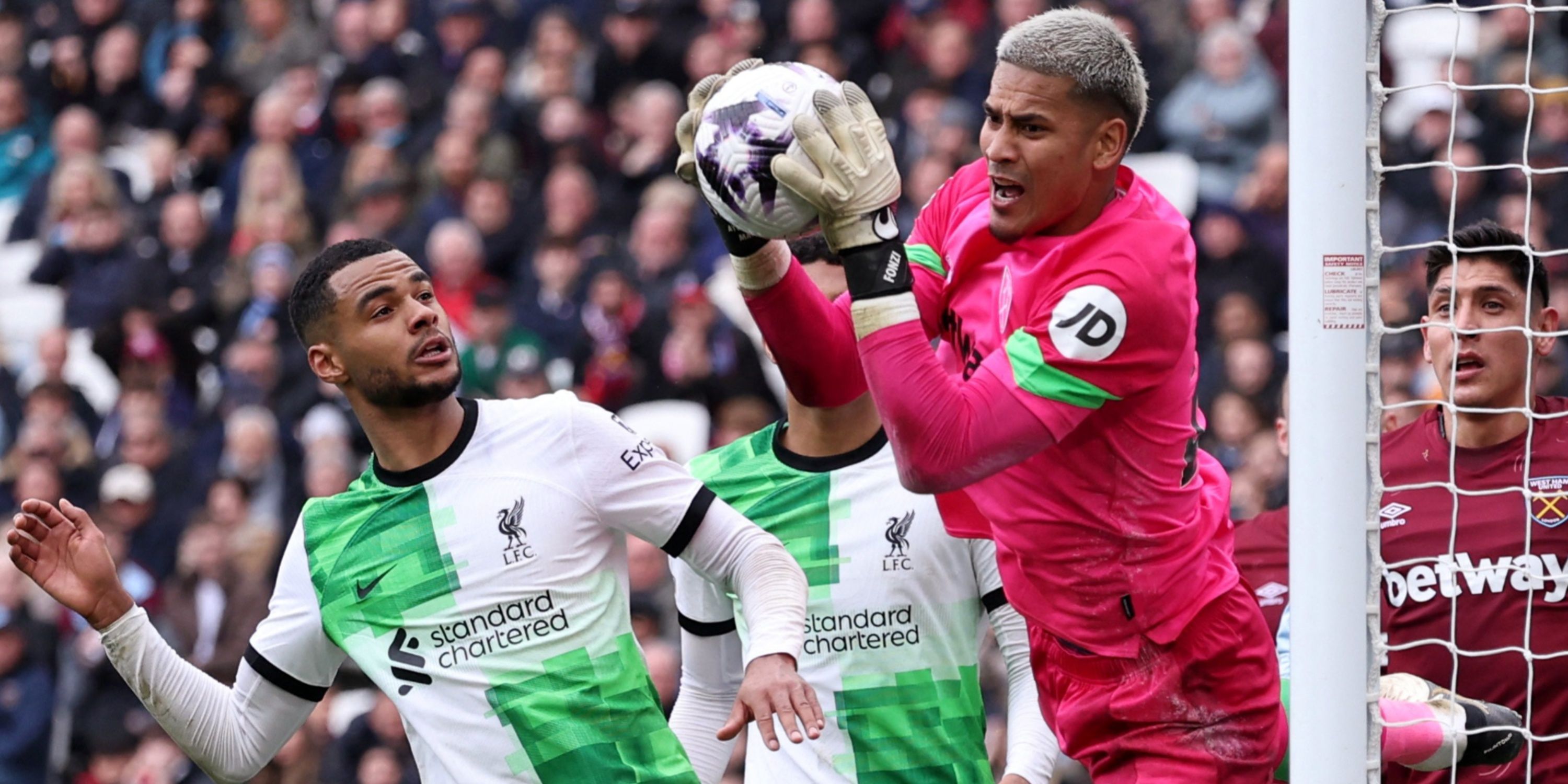 West Ham United's Alphonse Areola in action with Liverpool's Cody Gakpo