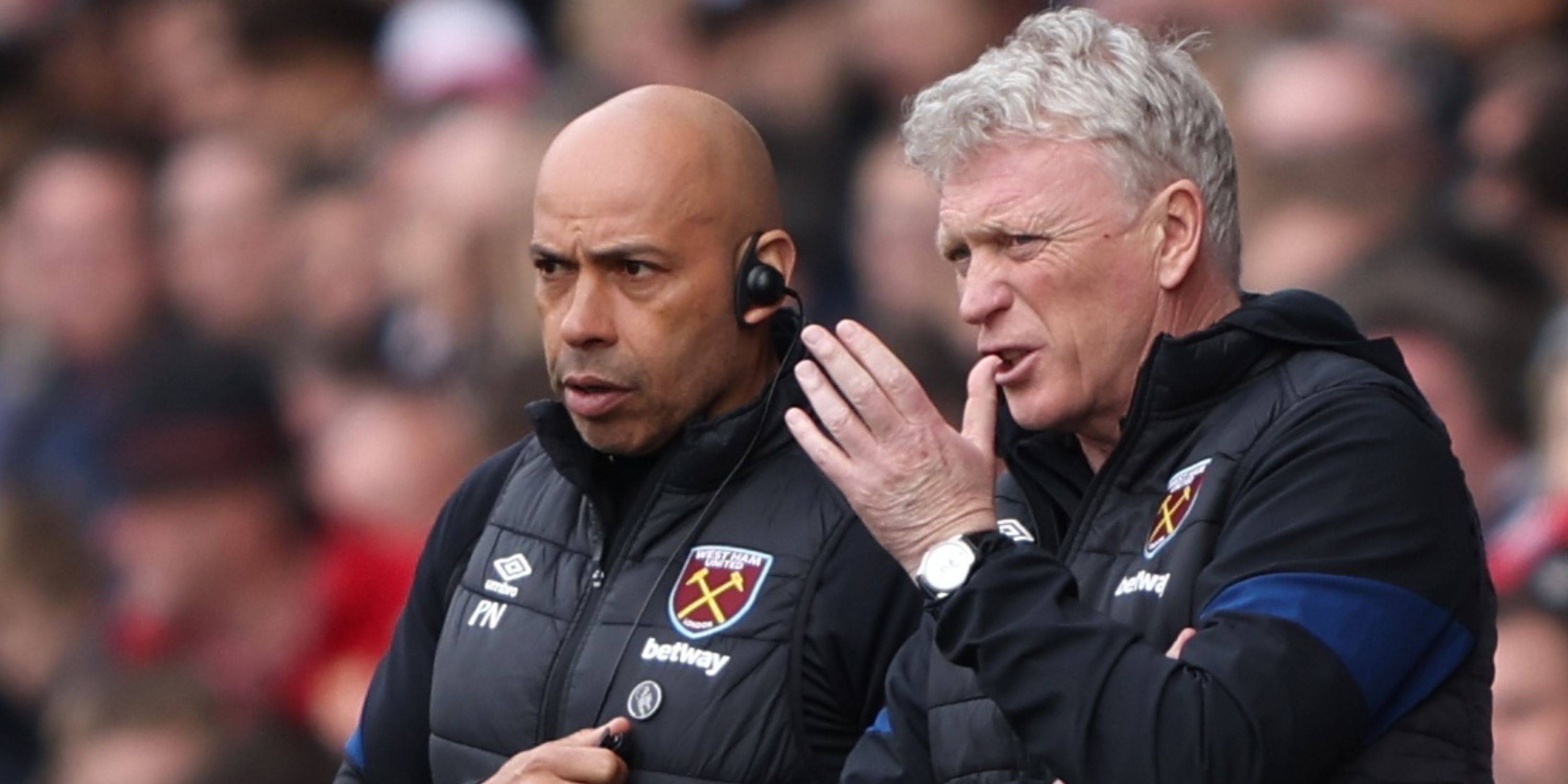 Paul Nevin in discussion with West Ham manager David Moyes