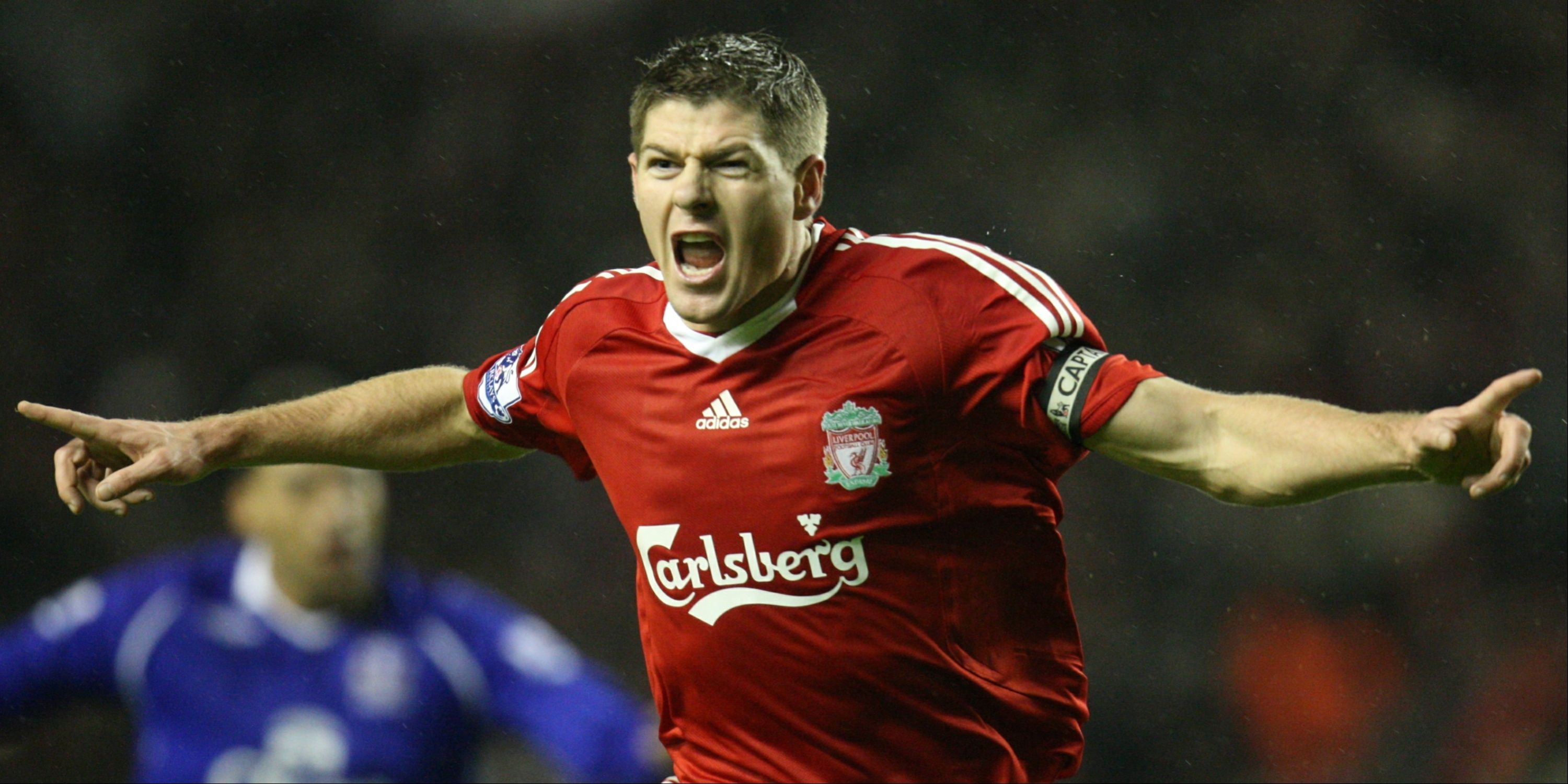 Steven Gerrard celebrates scoring for Liverpool against Everton. 