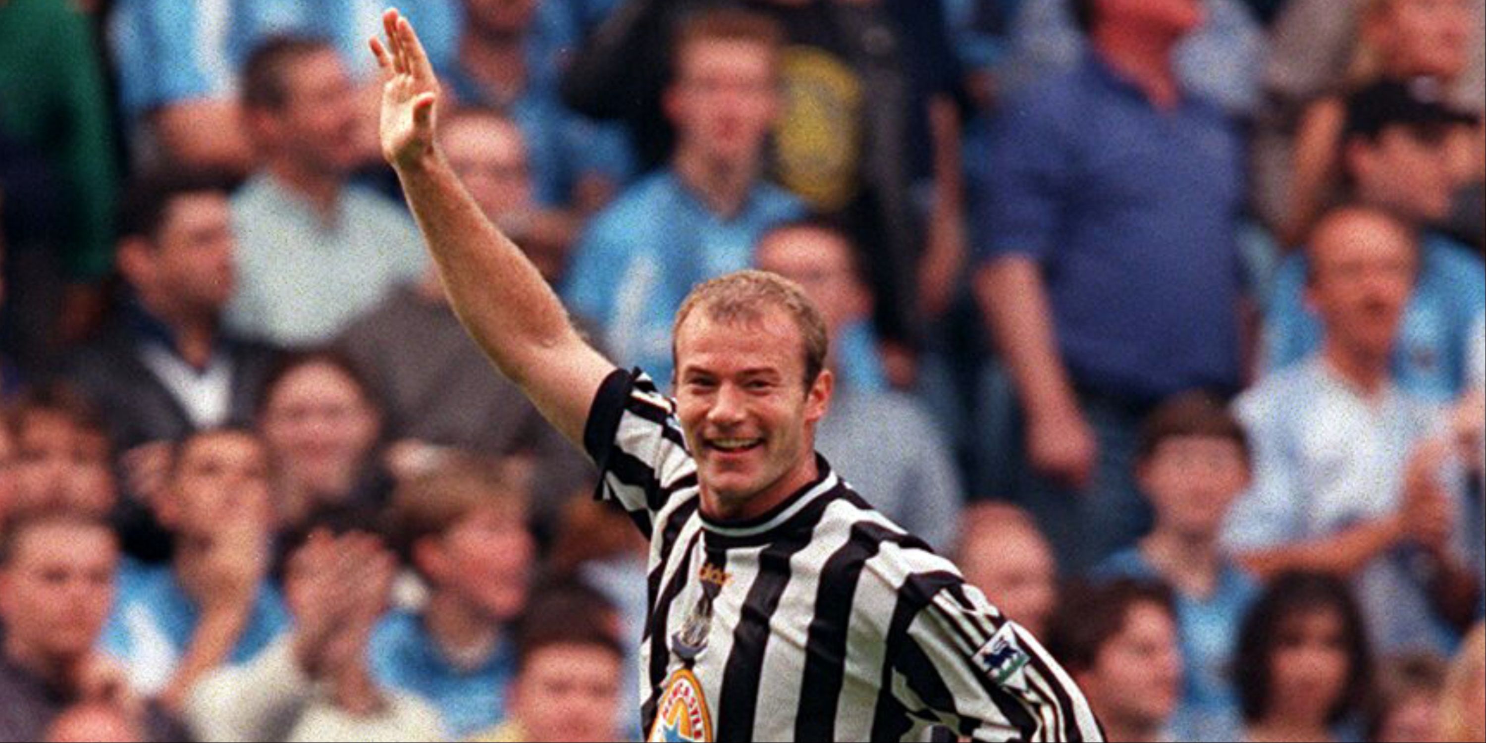 Alan Shearer celebrates scoring for Newcastle United. 