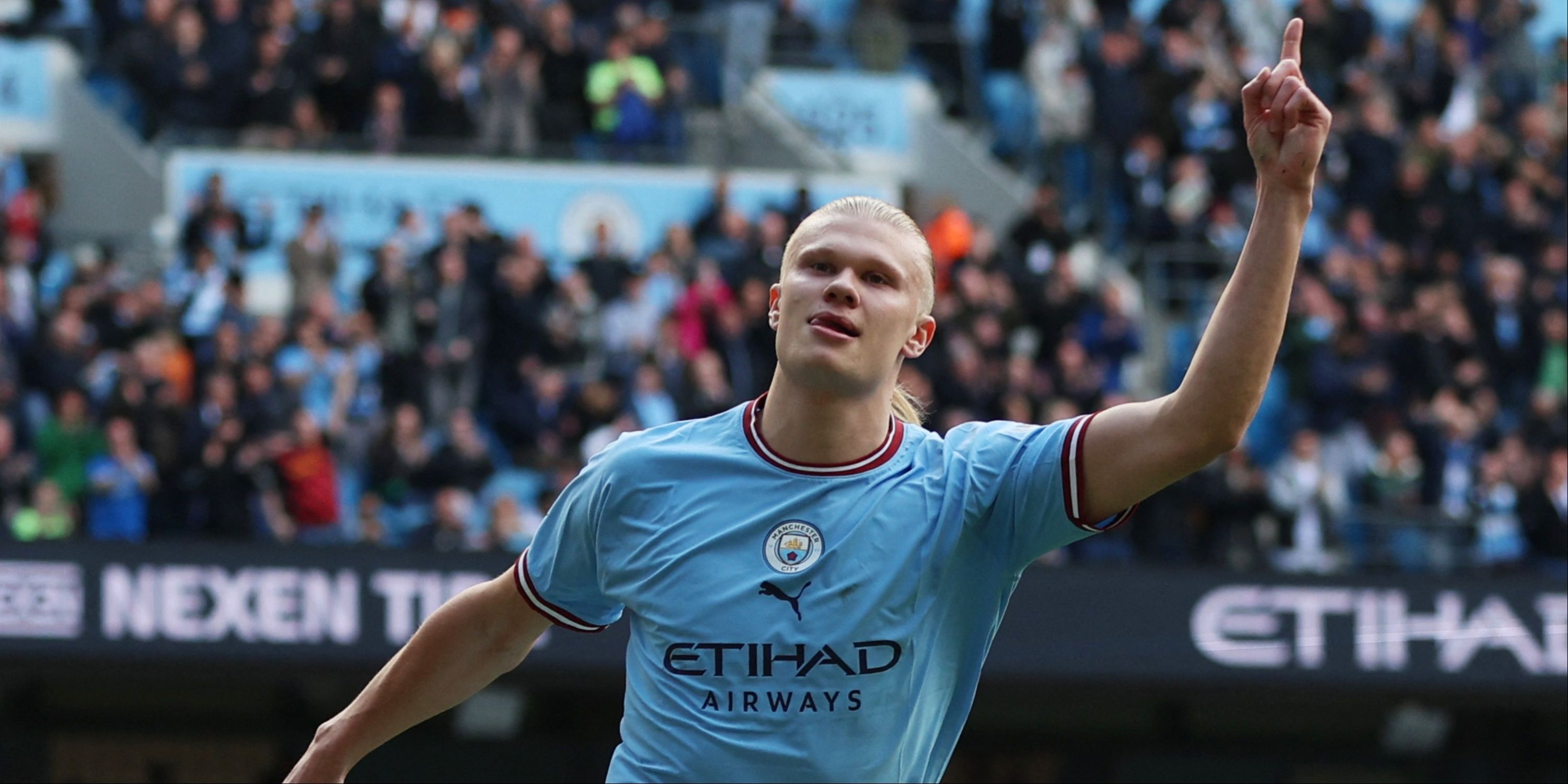 Erling Haaland celebrates scoring for Manchester City.