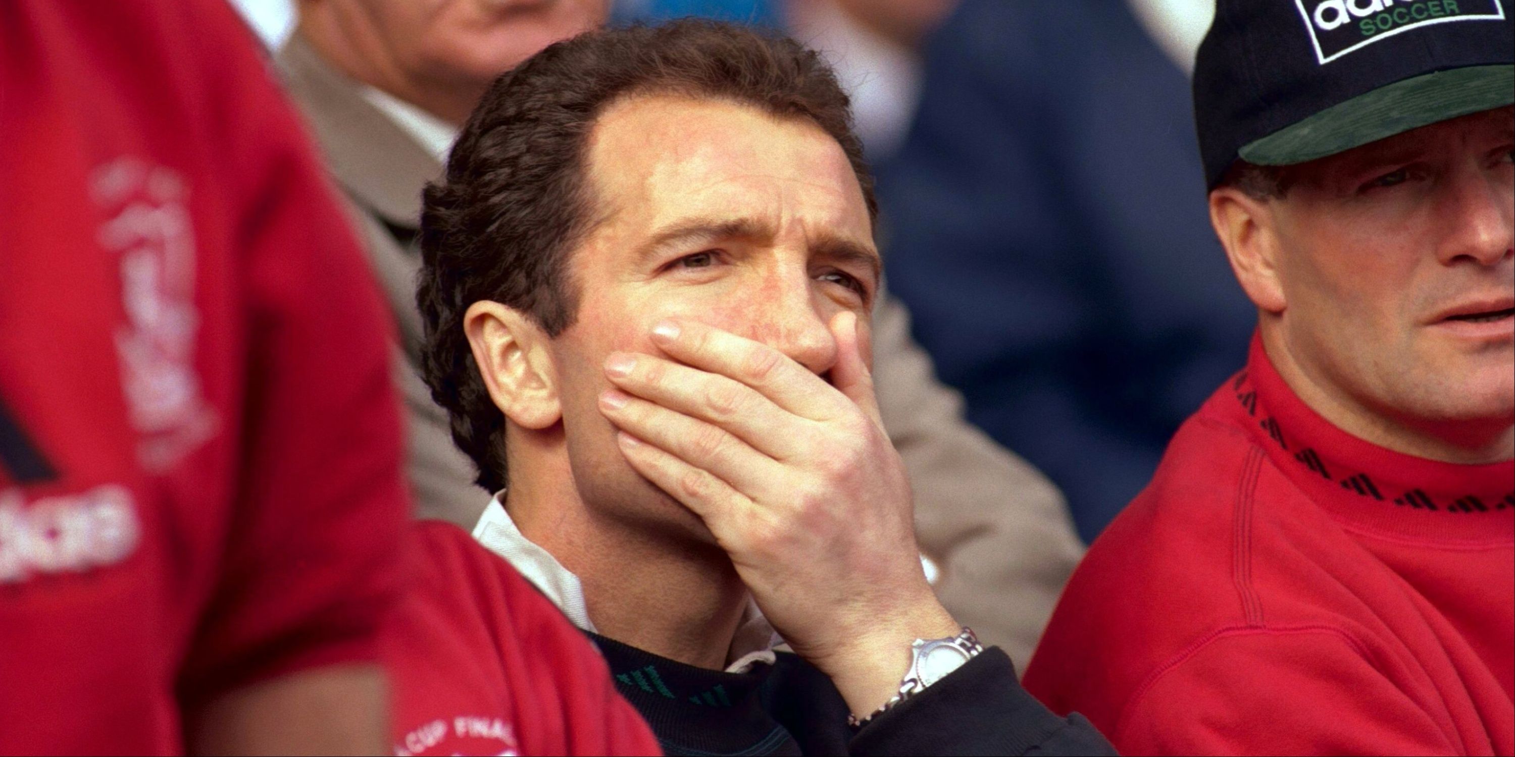 Liverpool manager Graeme Souness puts his hand to his face. 