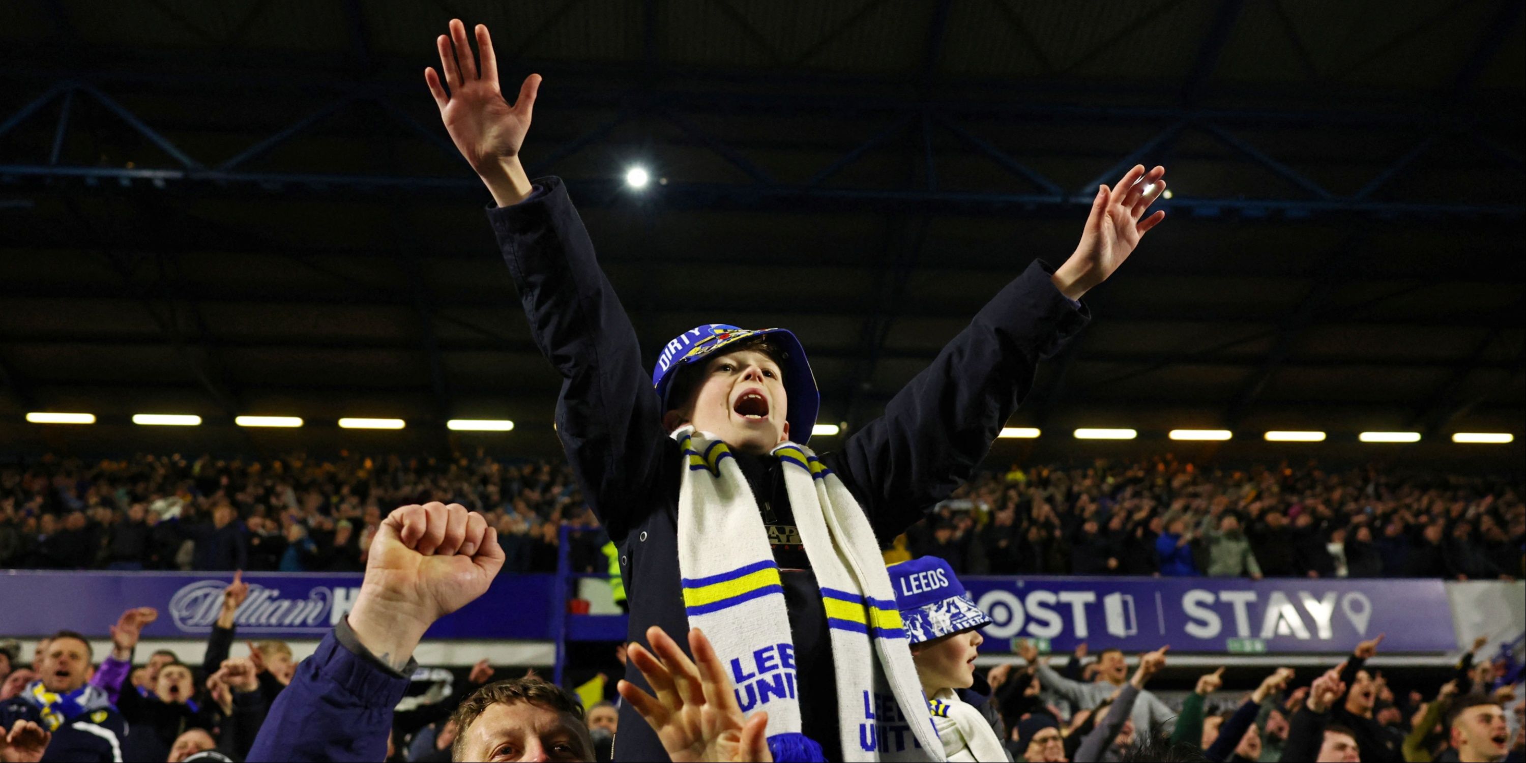 Leeds United fans cheer on their team. 