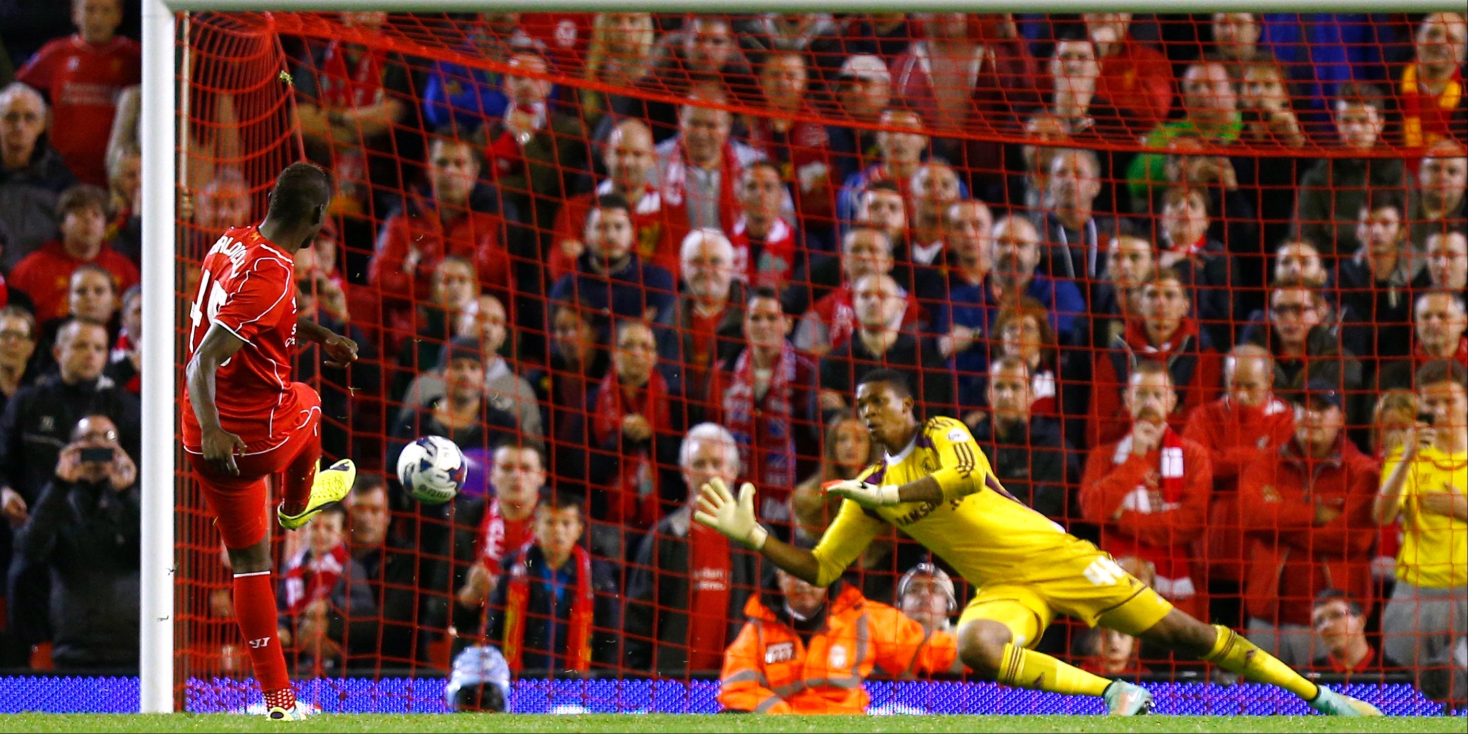 Liverpool's Mario Balotelli scores a penalty for Liverpool against Middlesbrough.