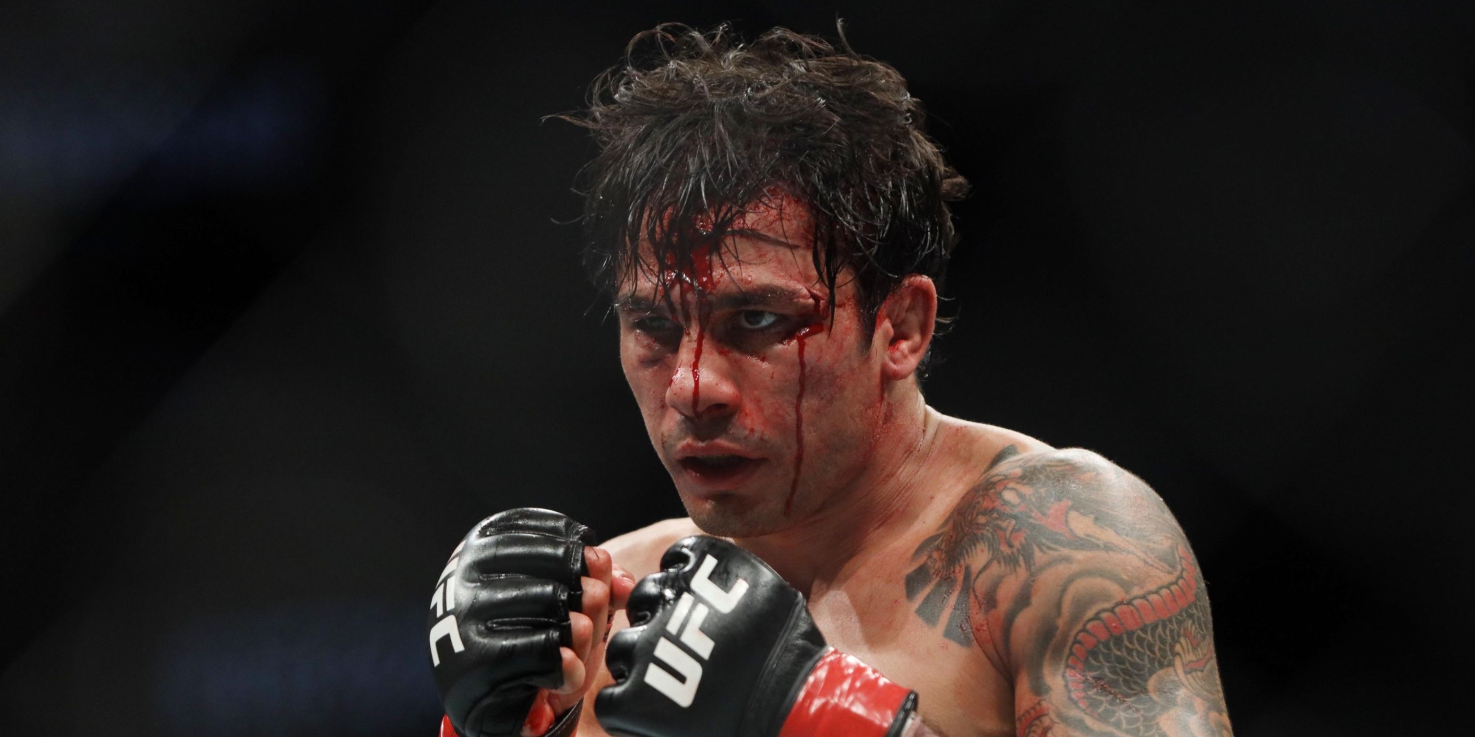 Alexandre Pantoja during UFC fight with Deiveson Figueiredo.