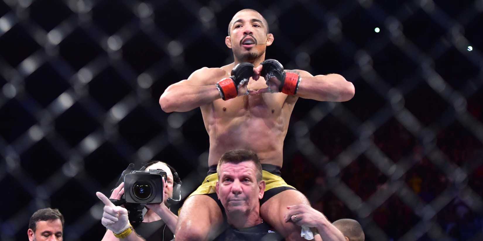 Jose Aldo celebrates UFC win 