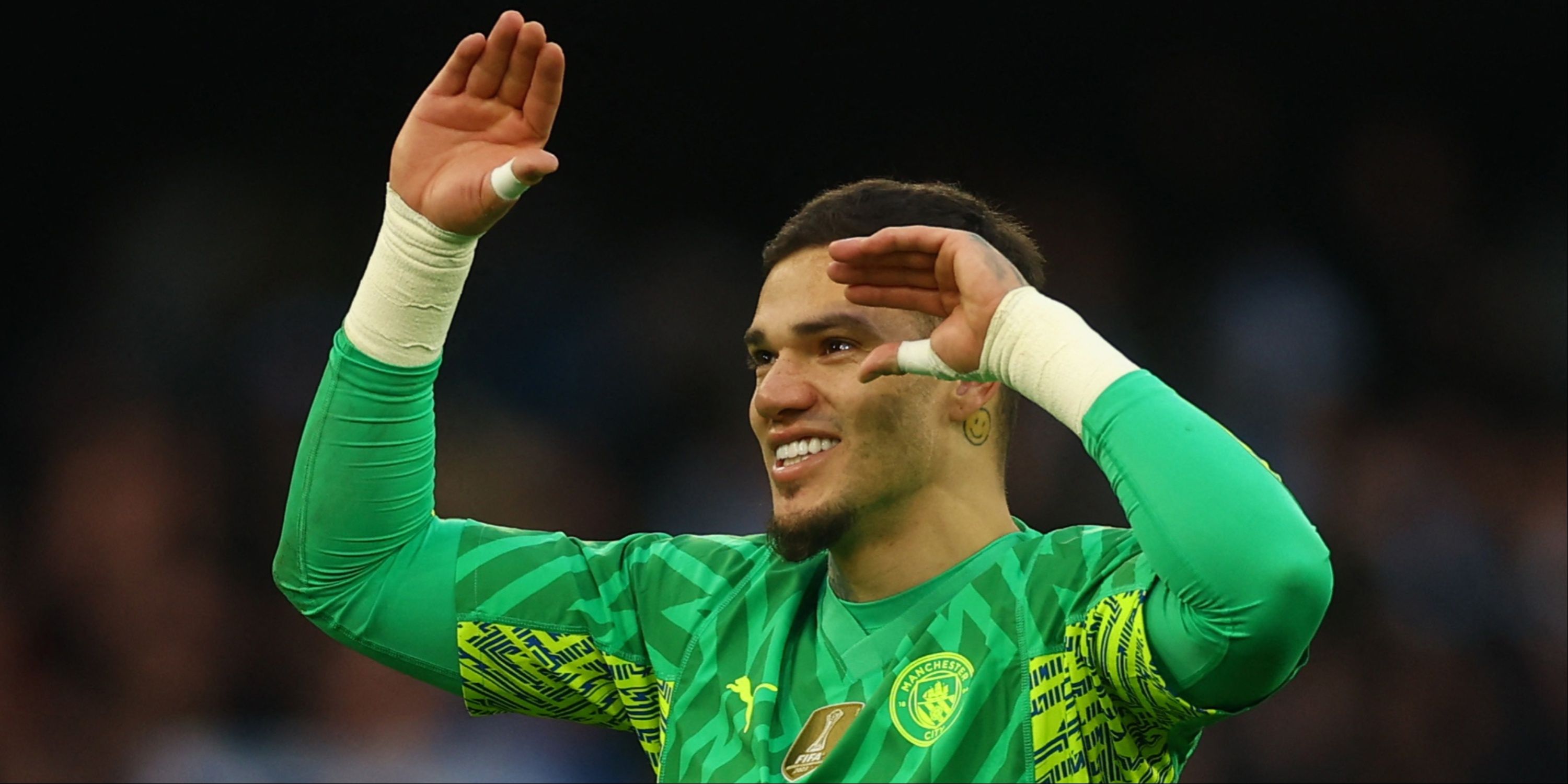 Ederson celebrating