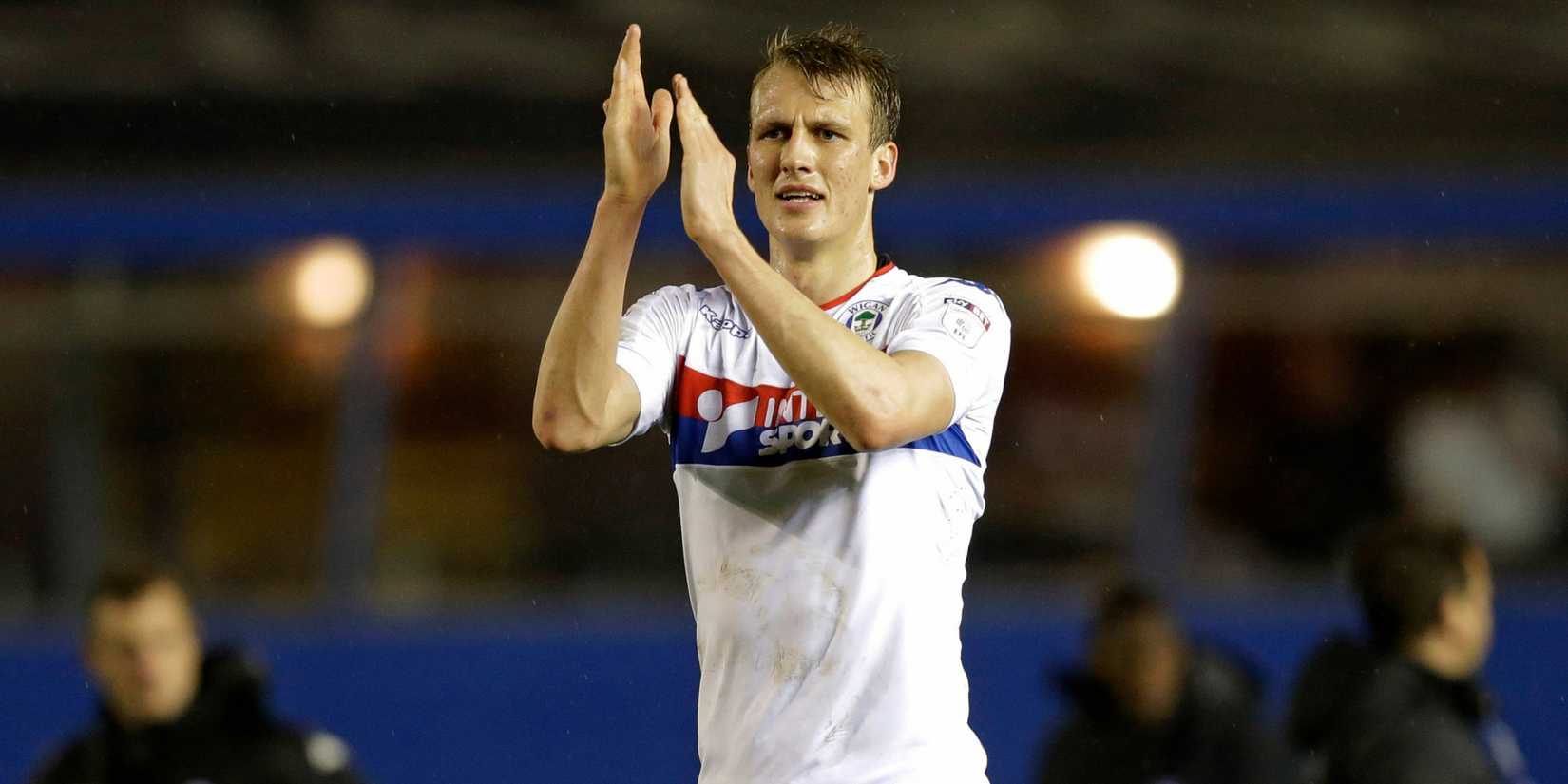 Dan Burn applauding Wigan Athletic fans