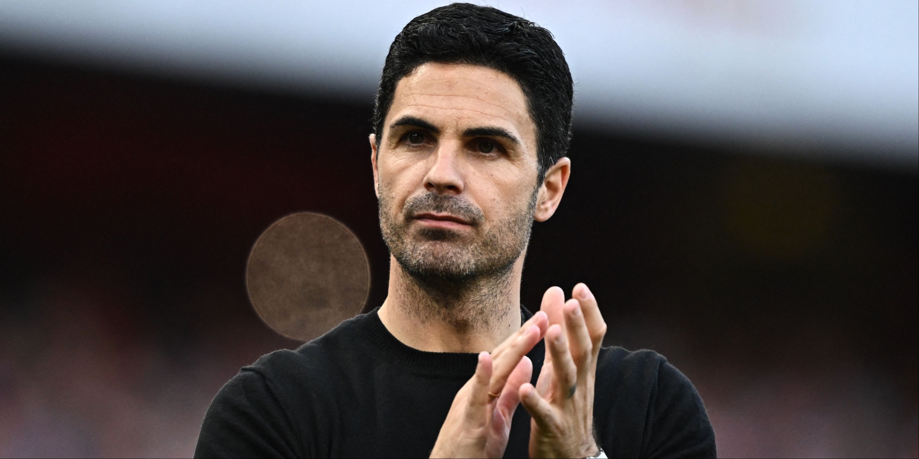 Arsenal boss Mikel Arteta applauding the supporters