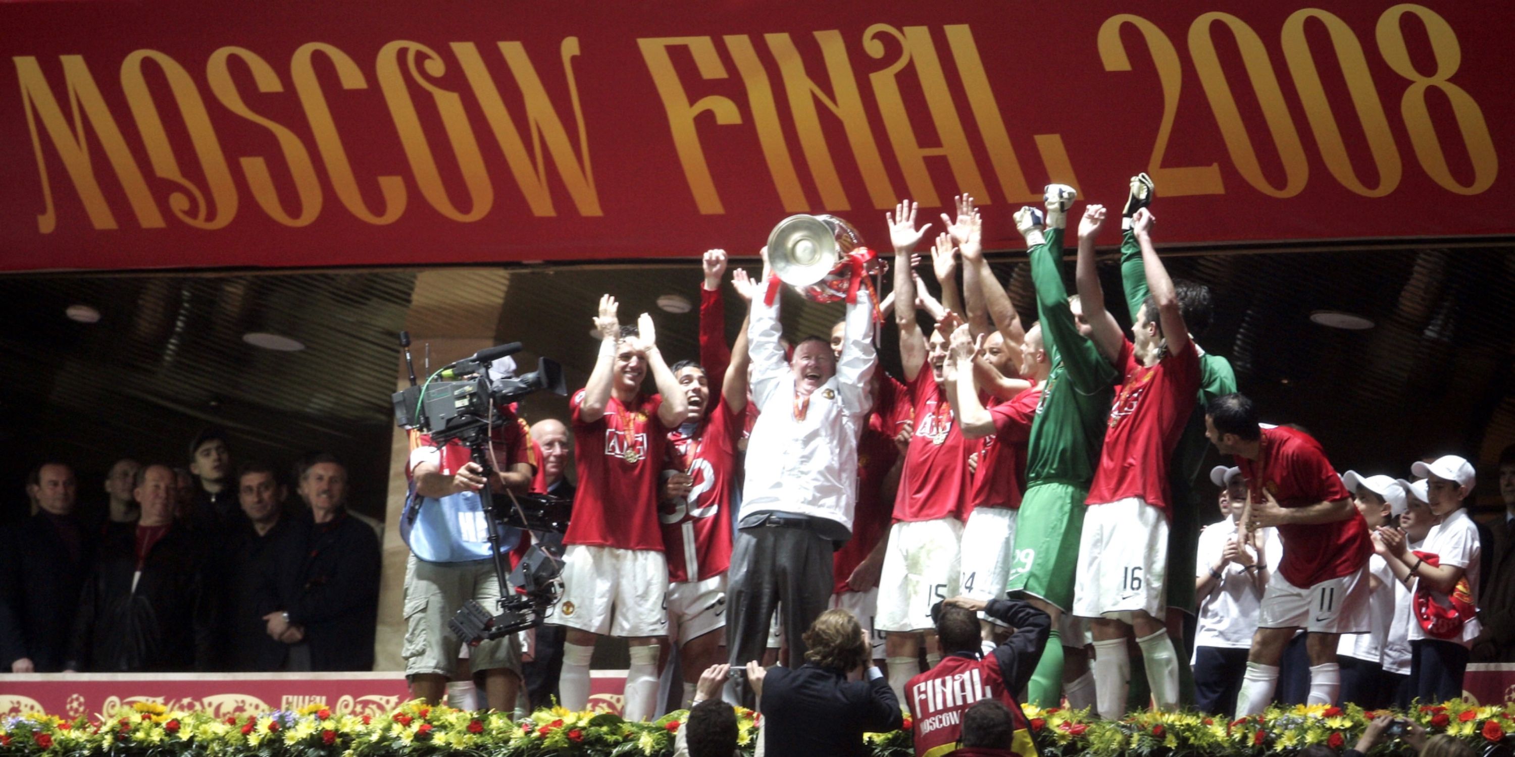 Sir Alex Ferguson with the Champions League trophy