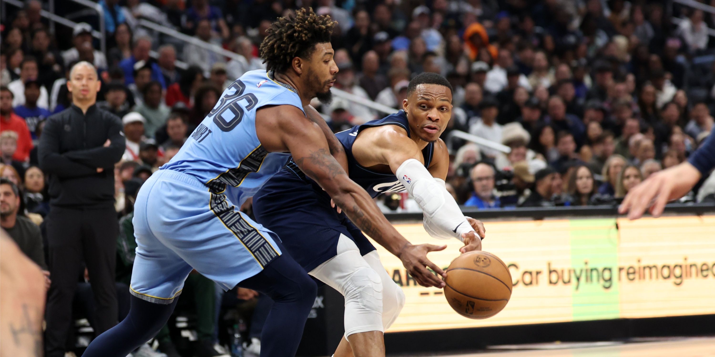 Grizzlies guard Marcus Smart deflects Clippers guard Russell Westbrook's pass
