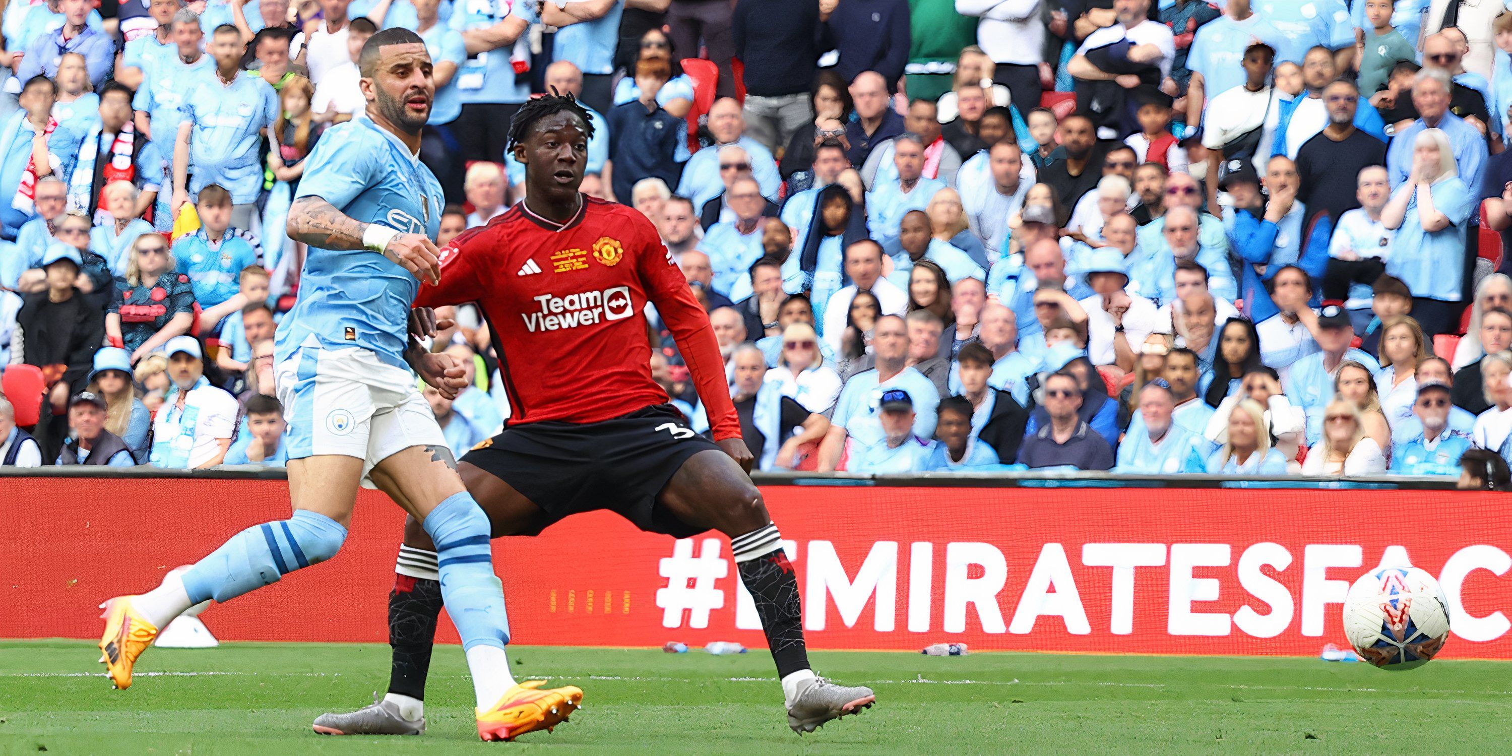 Manchester United's Kobbie Mainoo scores vs Man City