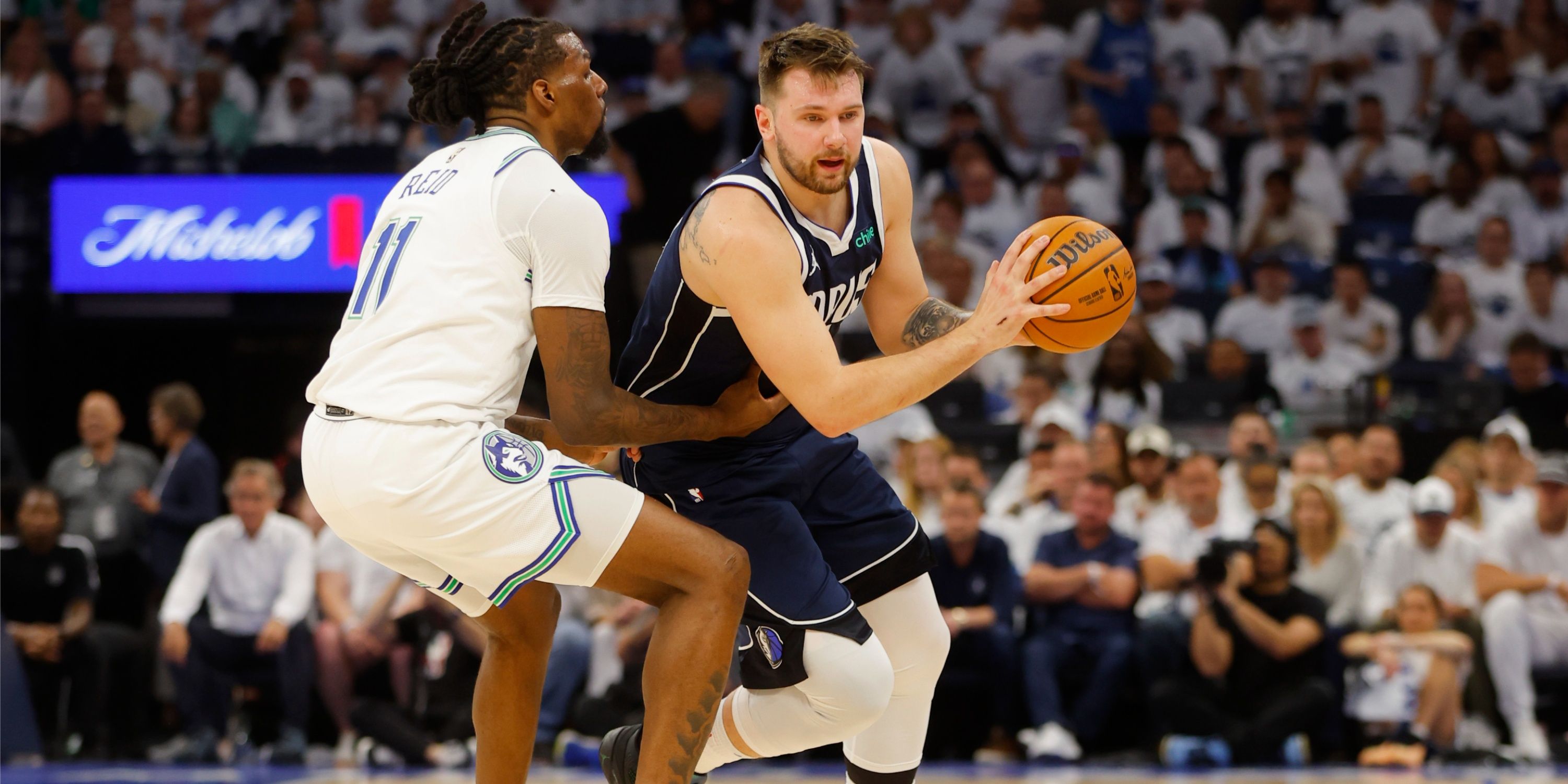 Naz Reid guards Luka Doncic