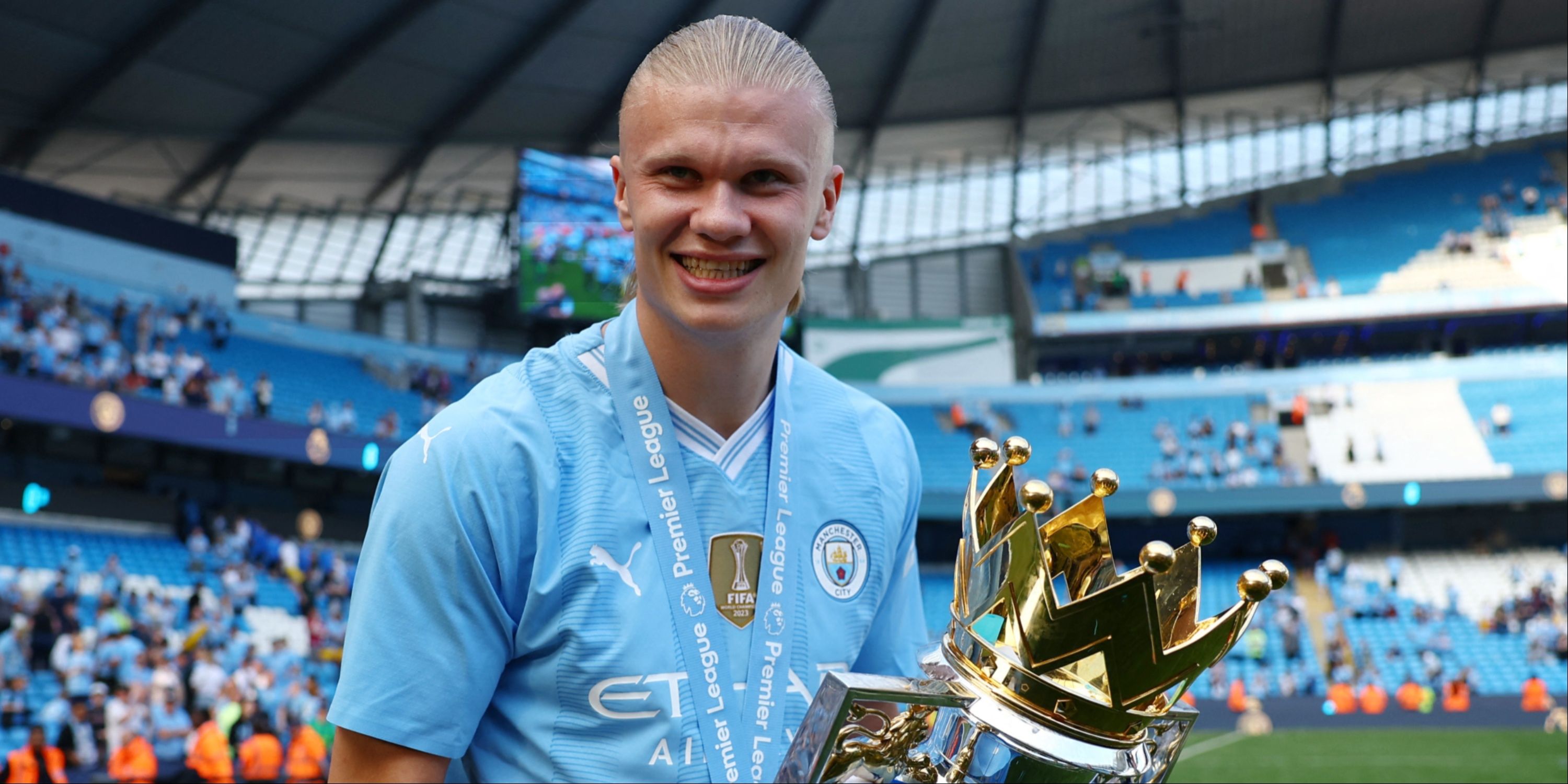 Erling Haaland with the Premier League trophy