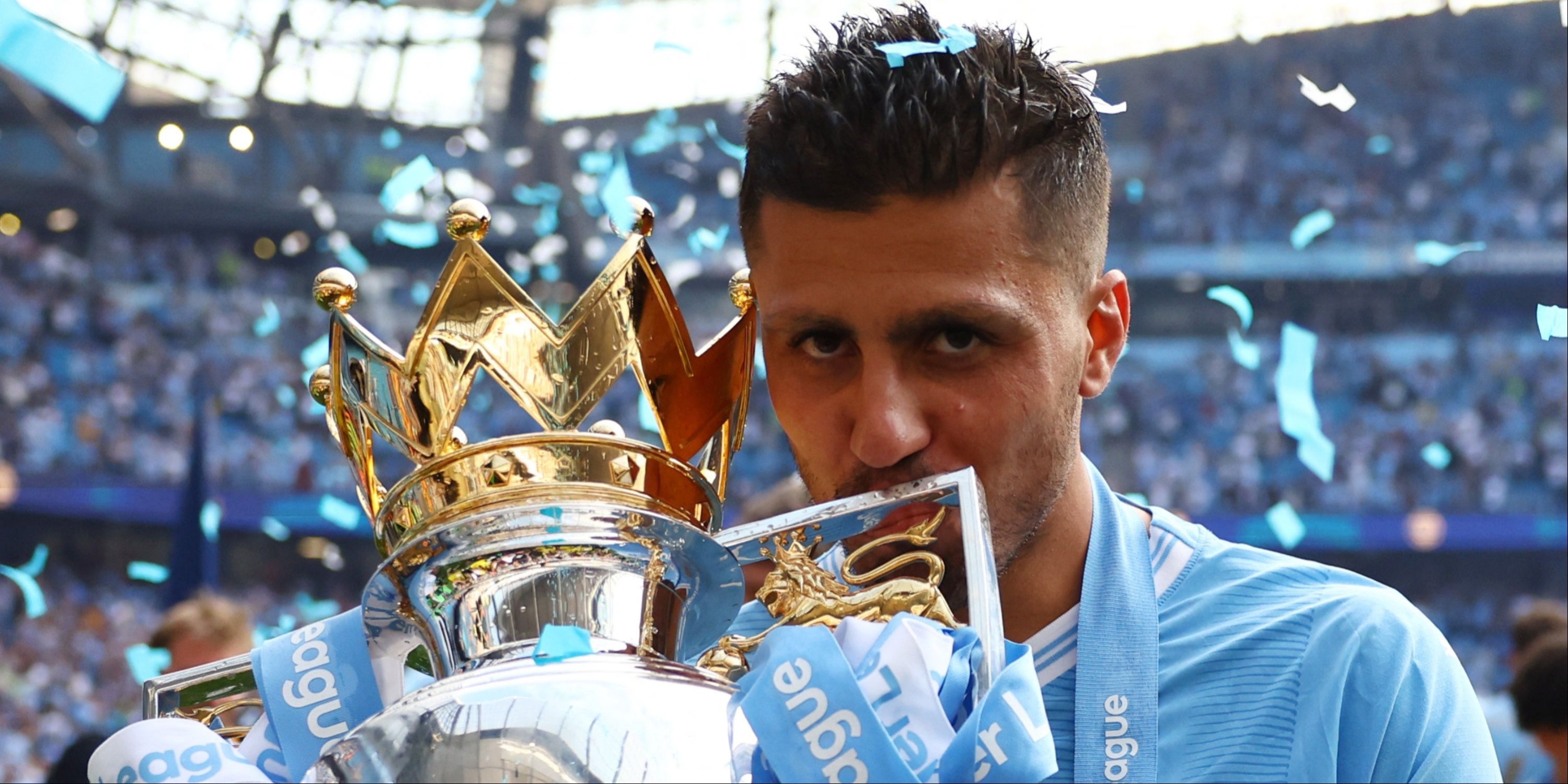Rodri with the Premier League trophy