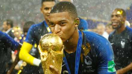 Kylian Mbappe with the World Cup