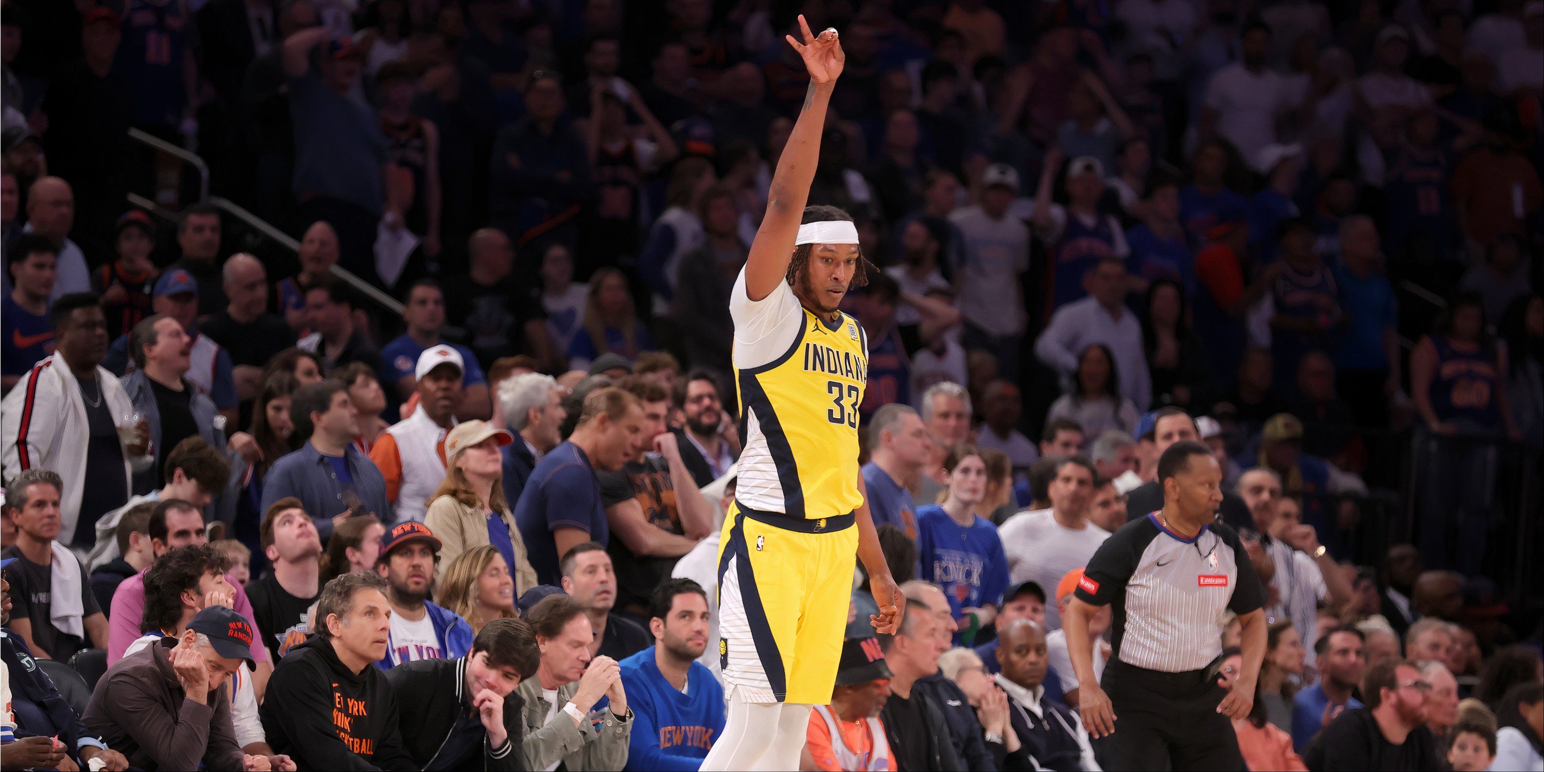 Myles Turner celebrating a three