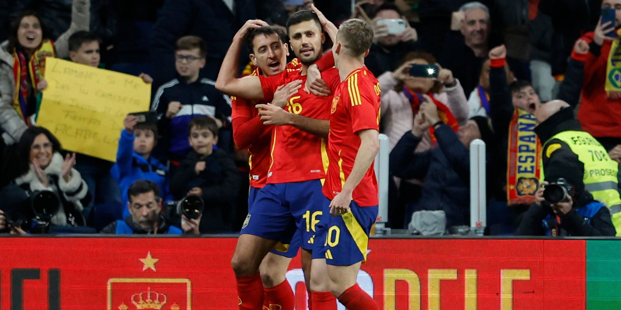 Spain players celebrating vs Brazil