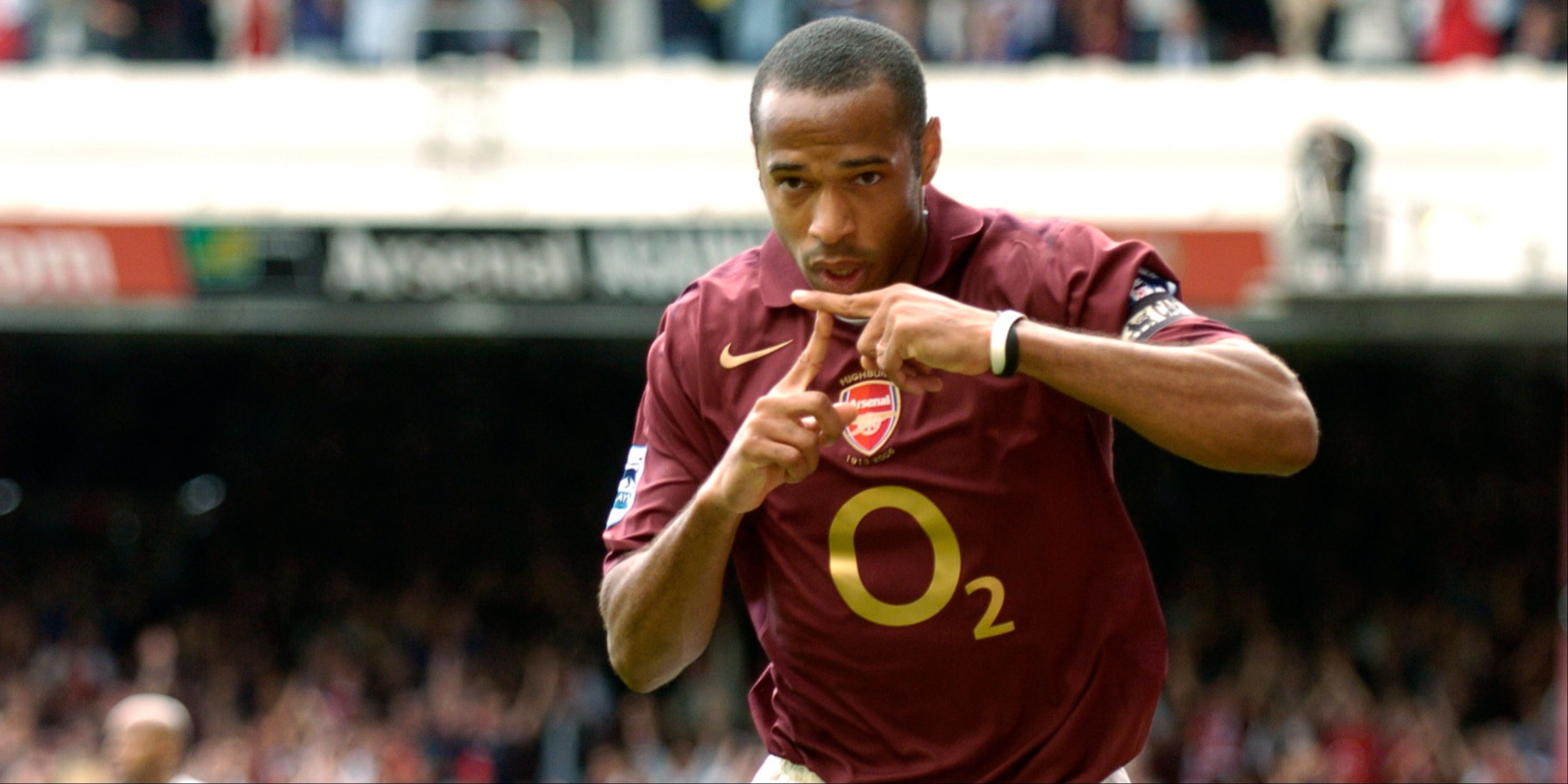 Thierry Henry celebrates scoring for Arsenal. 