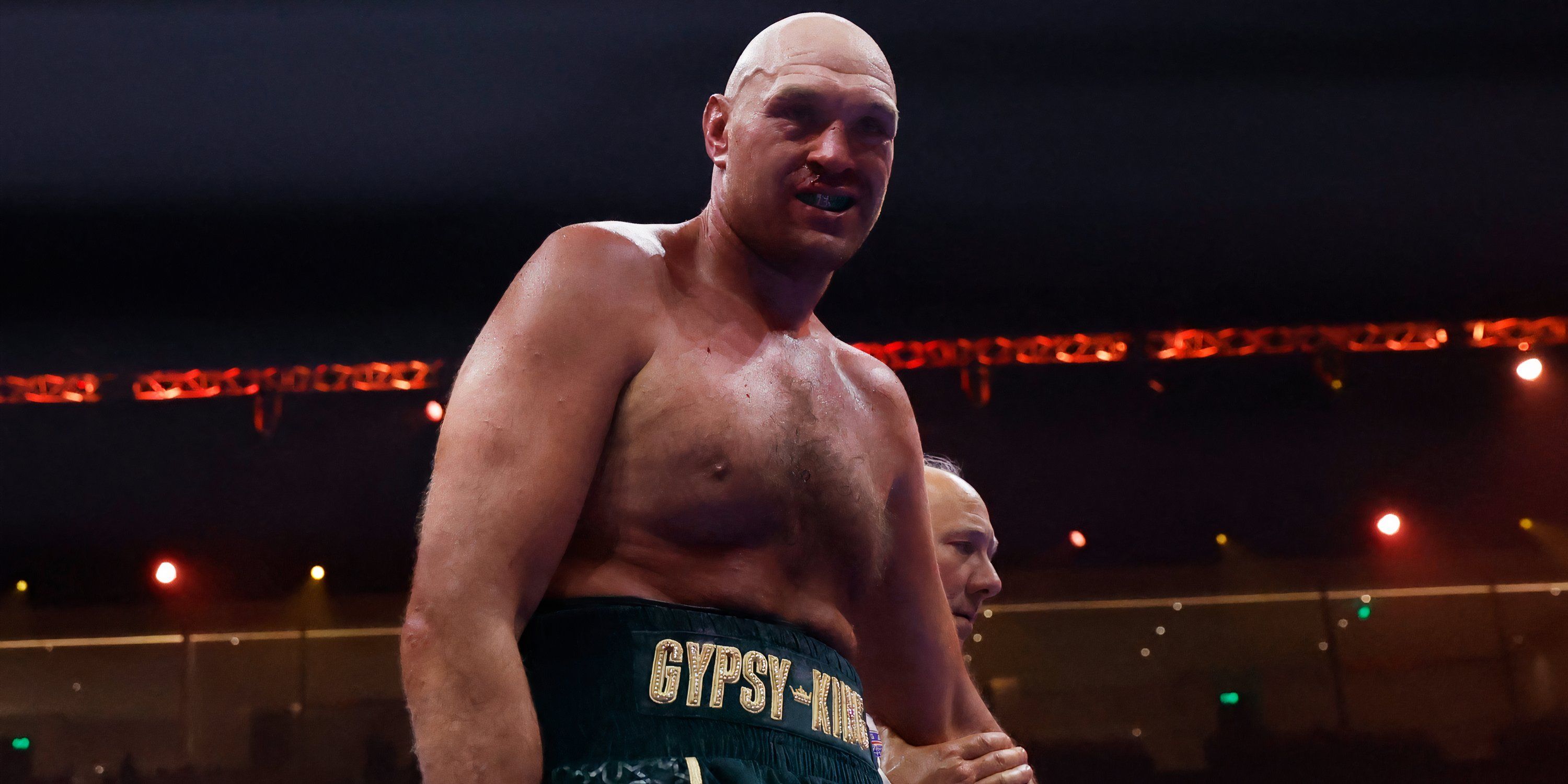 Tyson Fury poses in the ring