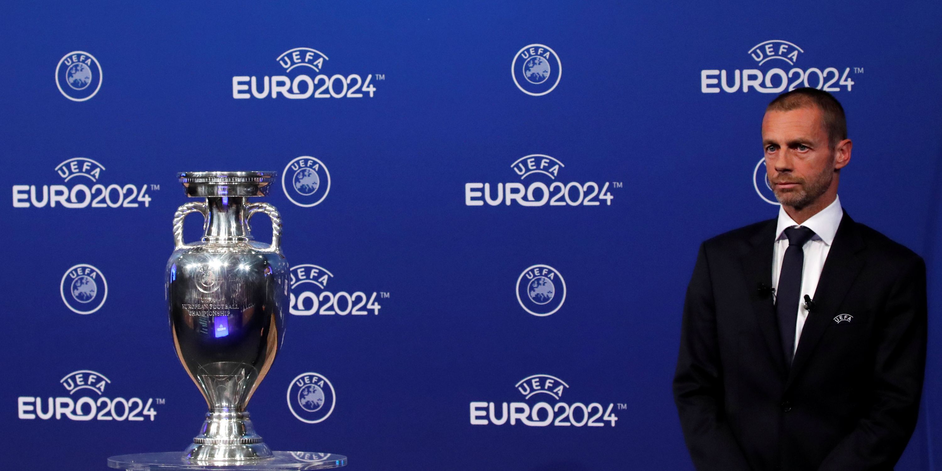 UEFA president Aleksander Ceferin stood next to Euro 2024 trophy