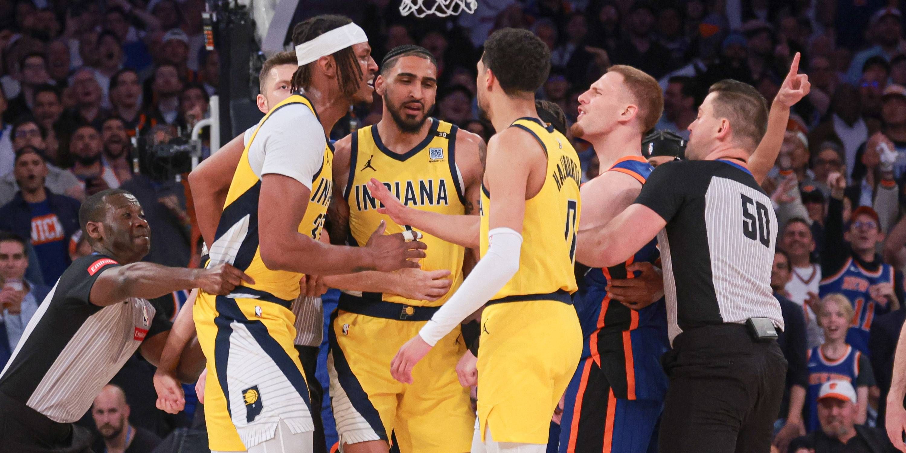 Donte DiVincenzo scuffles with the Indiana Pacers.