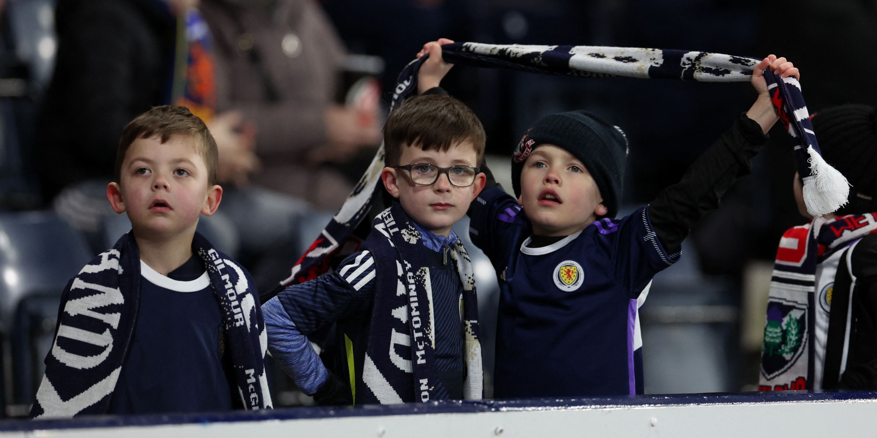 Young Scotland fans watching on