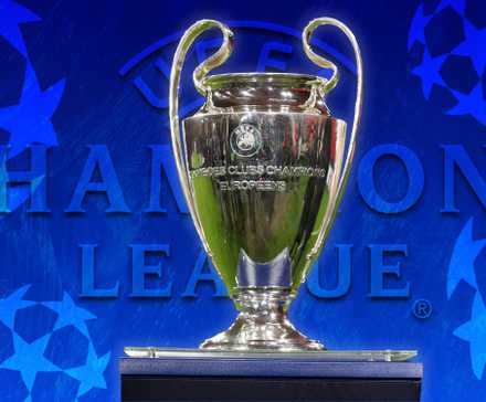 The Champions League trophy with the competition logo.