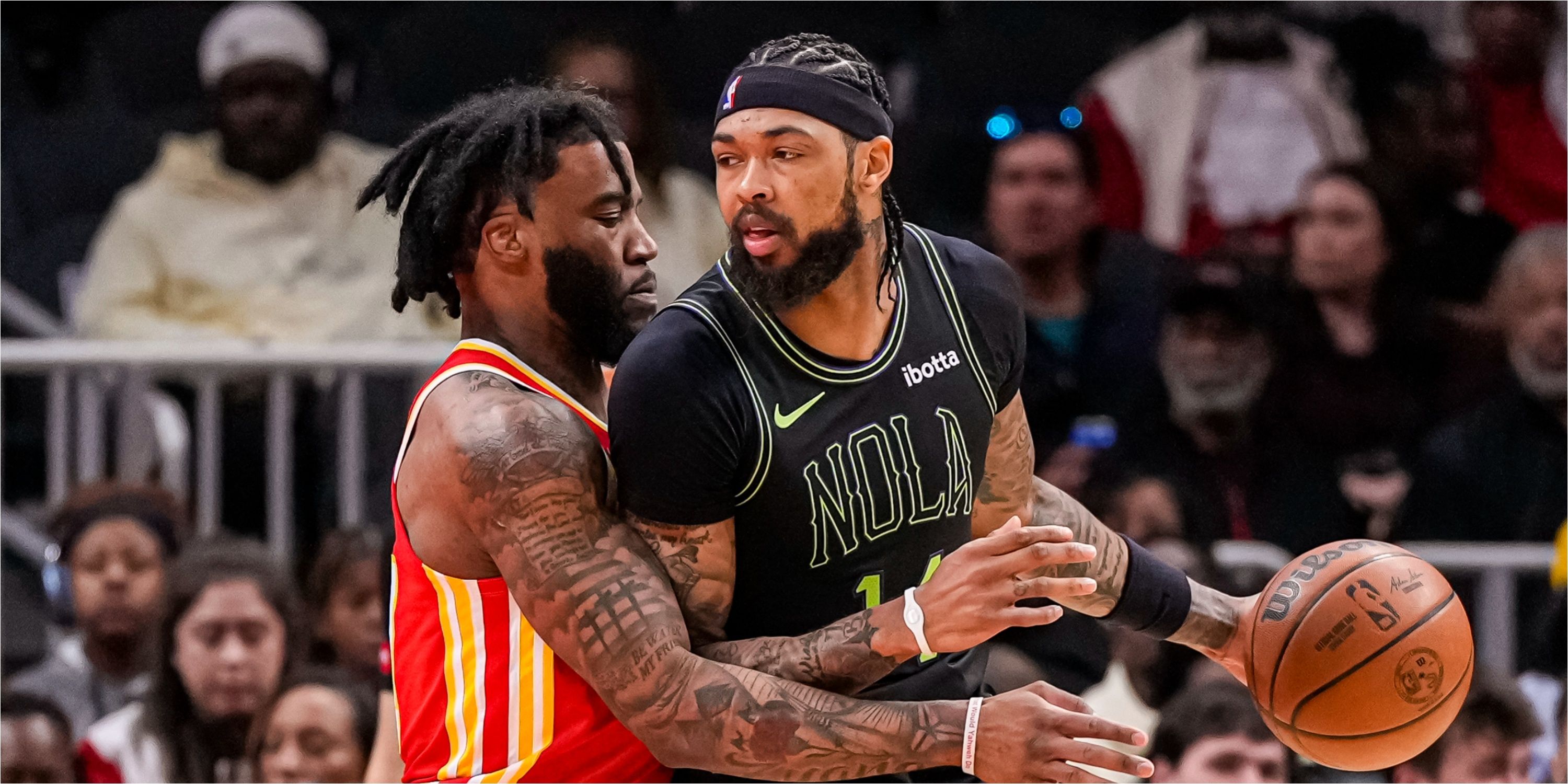 Brandon Ingram faces Hawks defenseman Saddiq Bey