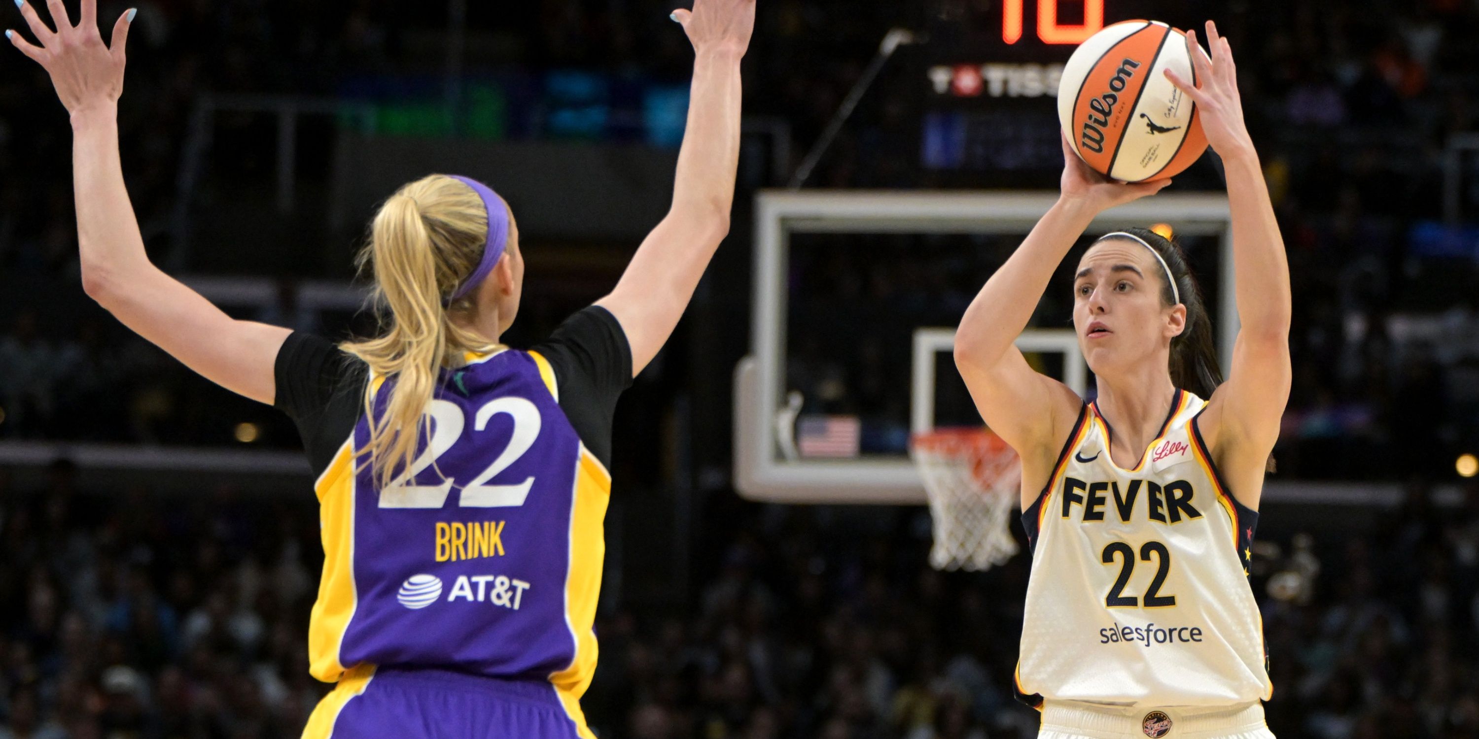 Caitlin Clark shooting over Cameron Brink