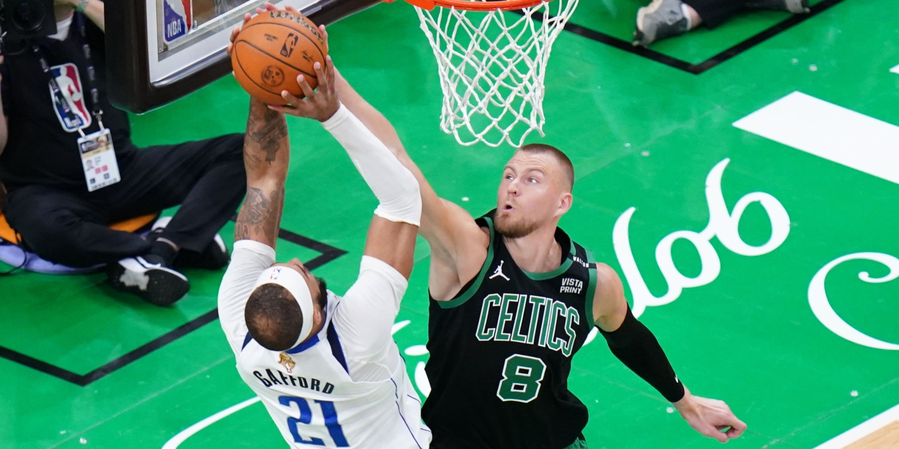 Celtics' Kristaps Porzingis blocking Mavericks' Daniel Gafford