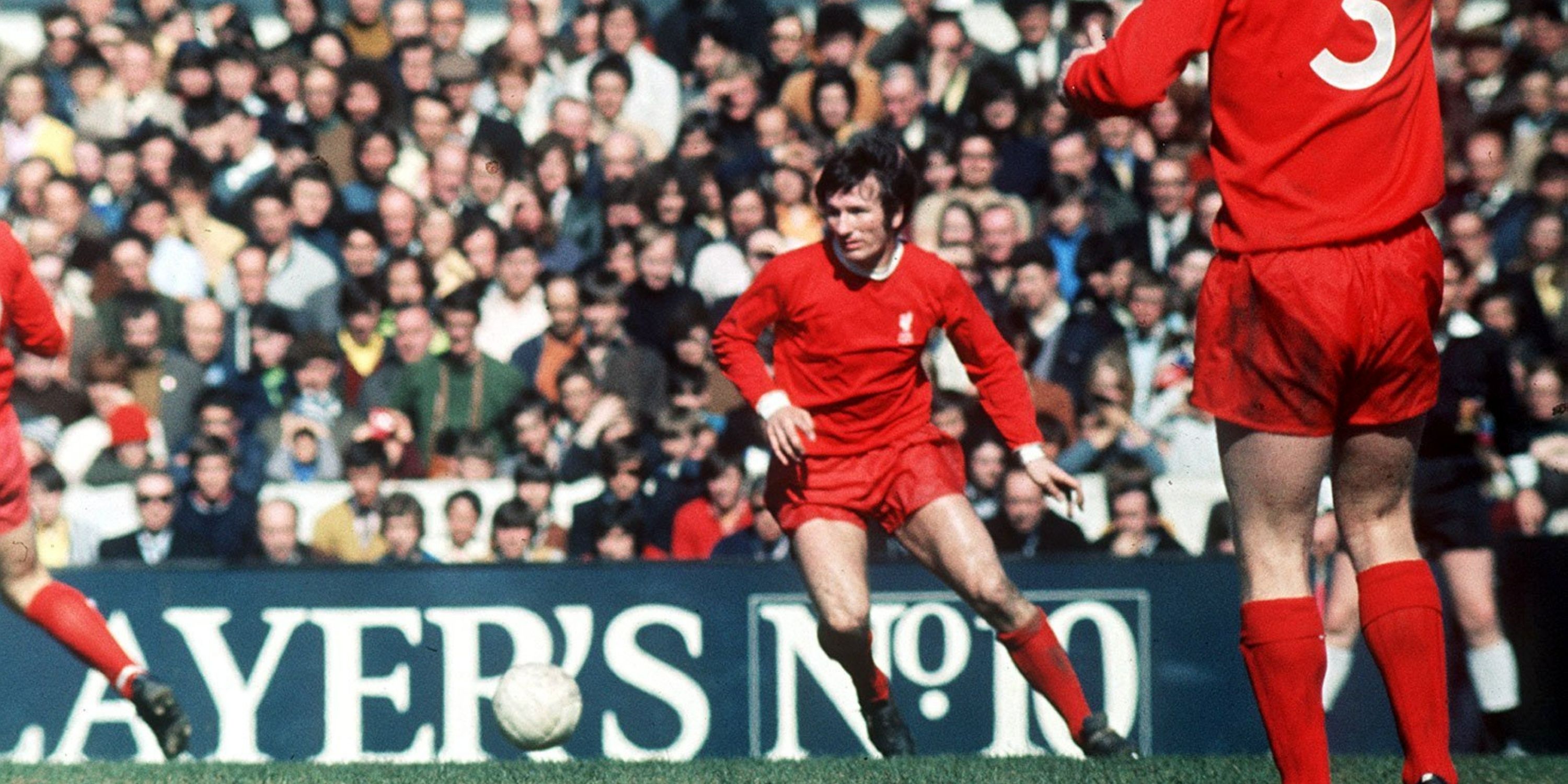 Liverpool's Tommy Smith goes after the ball