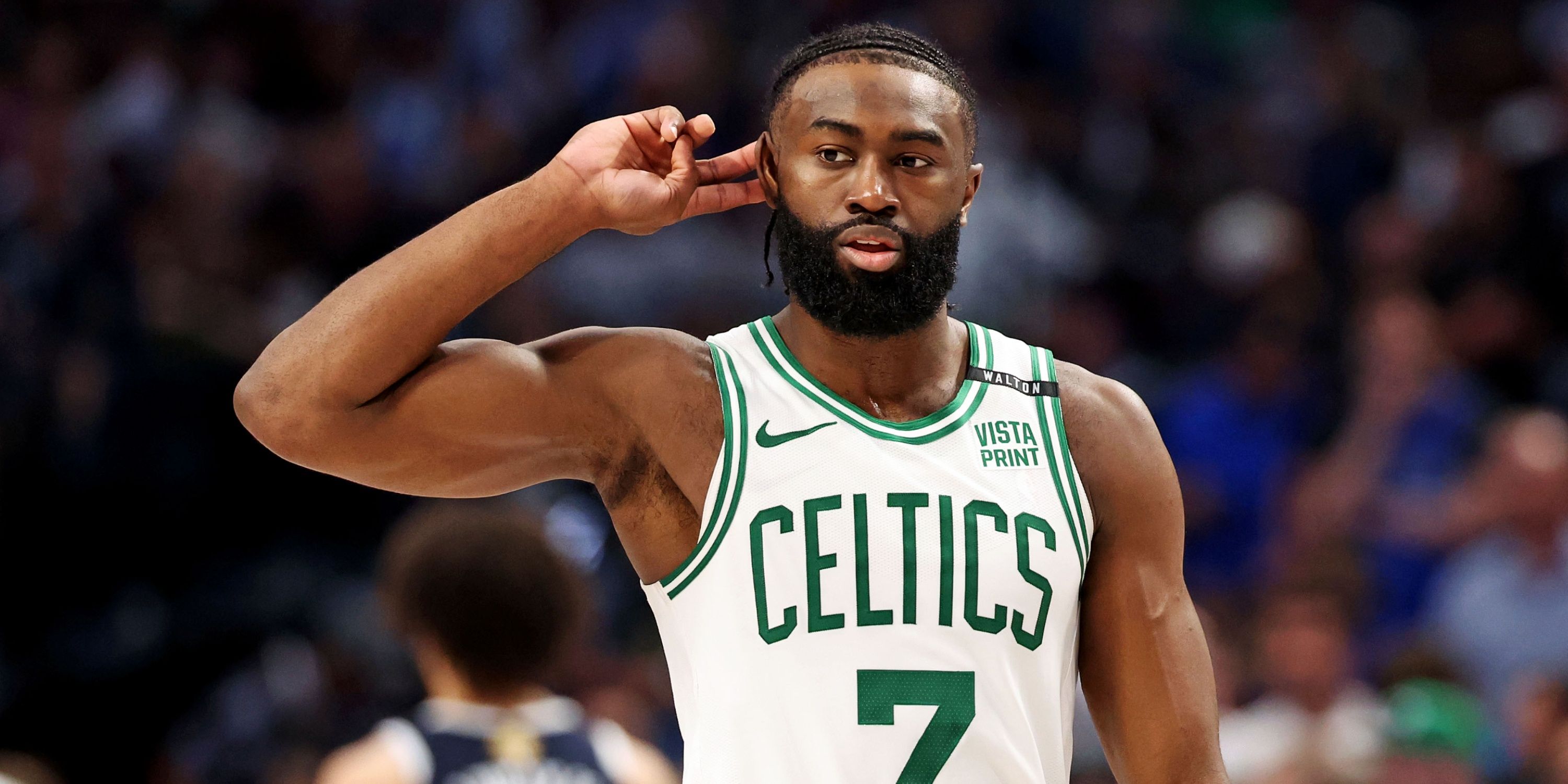 Celtics star Jaylen Brown points at ear