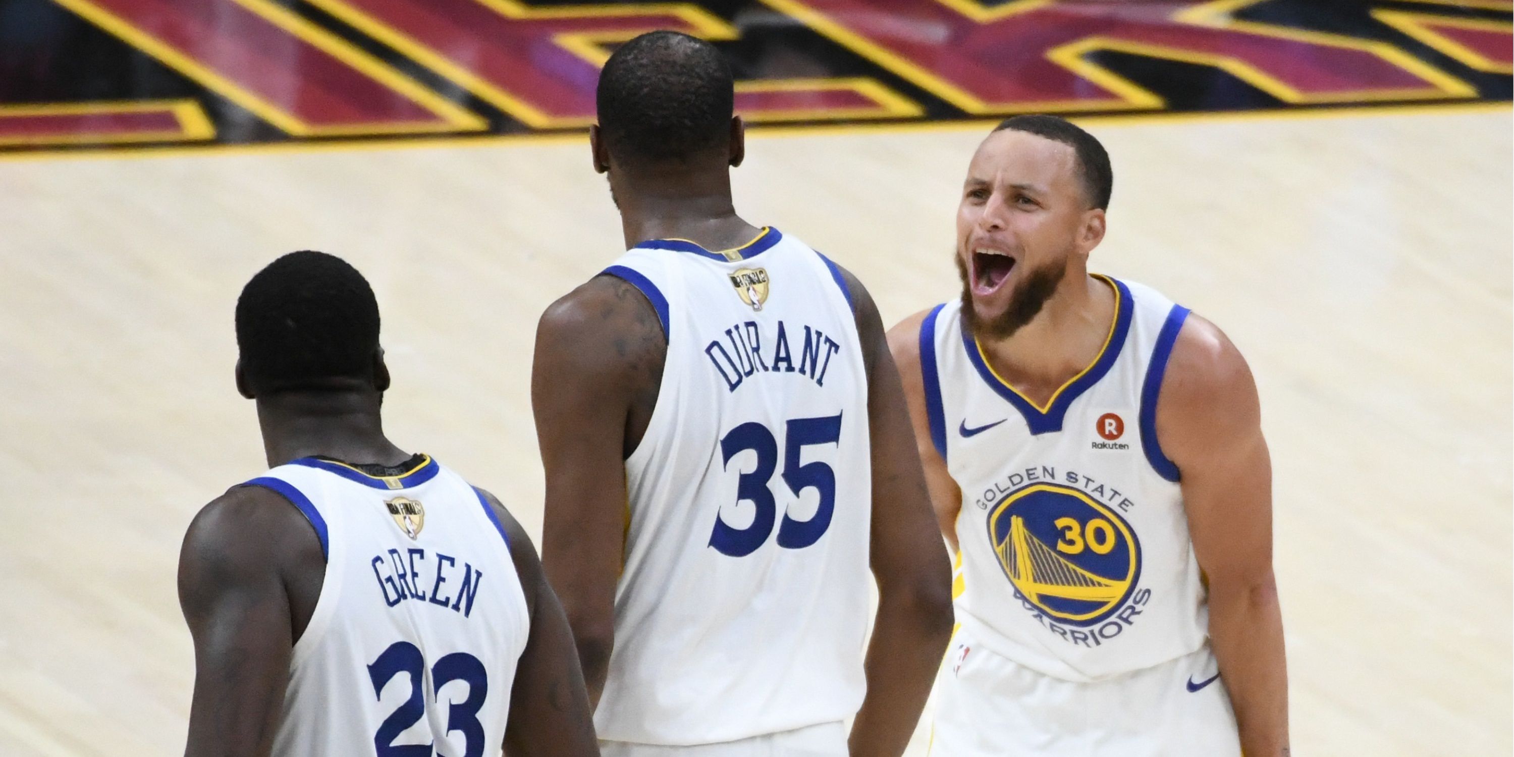 Golden State Warriors Draymond Green, Kevin Durant and Stephen Curry celebrate during Game 3 of the 2018 NBA Finals.