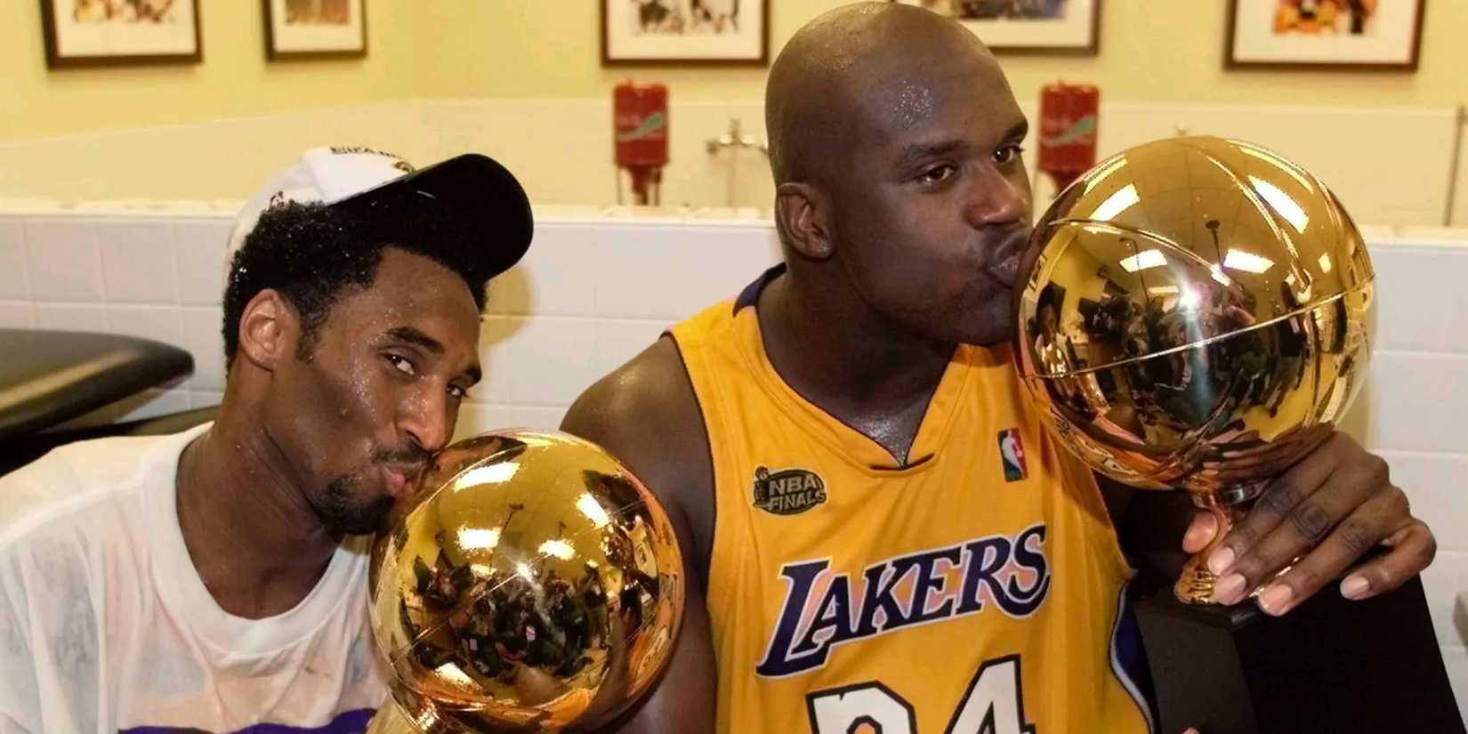 Kobe Bryant Shaquille O'Neal Los Angeles Lakers holding trophy