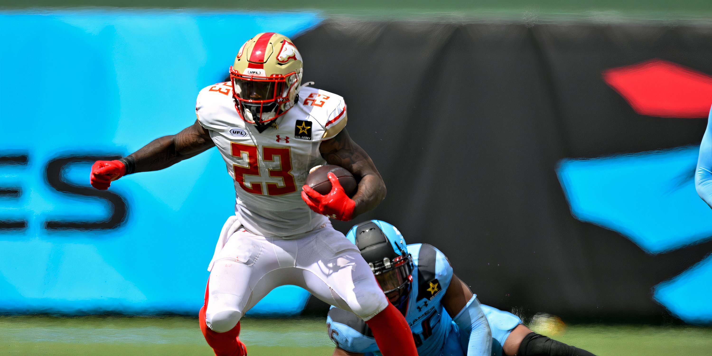 Birmingham Stallions RB Ricky Person avoiding a tackle in a game.