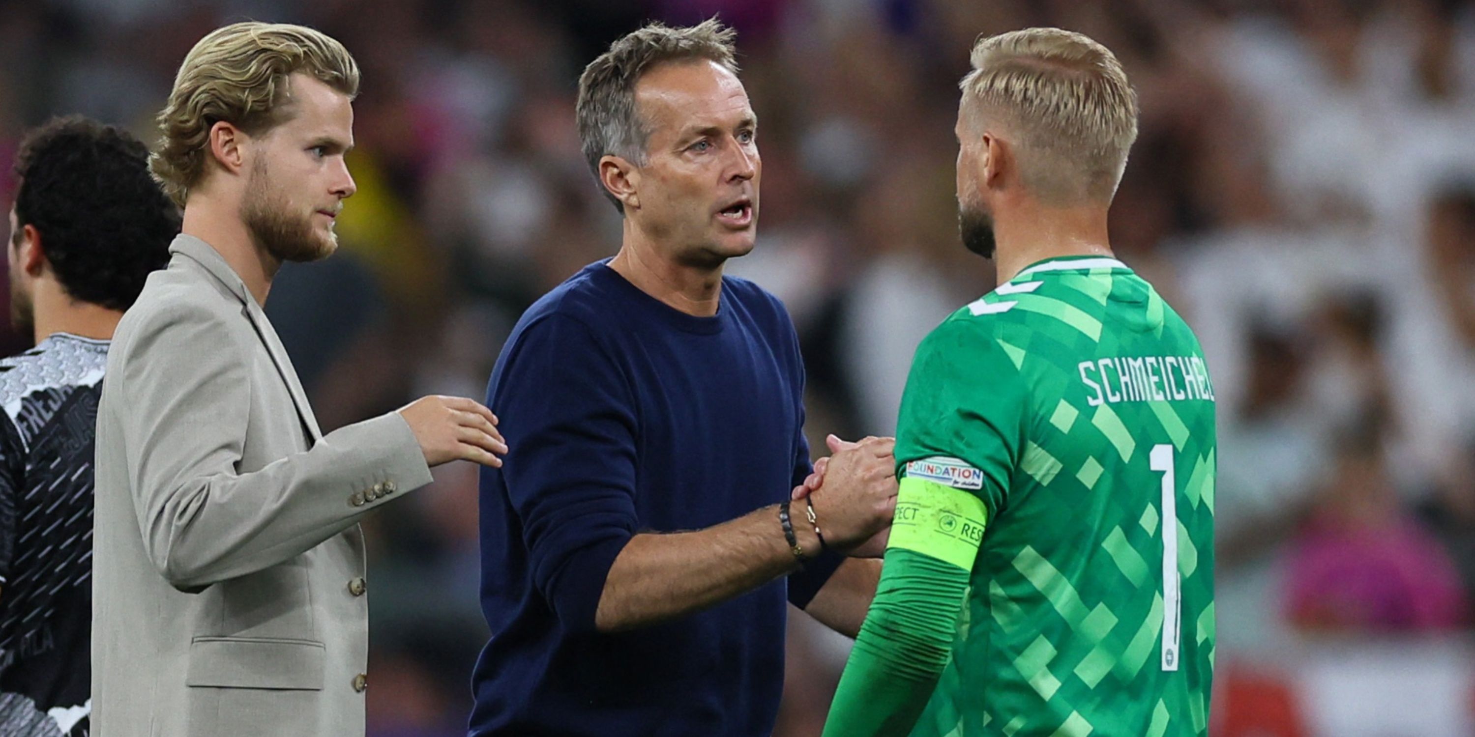 Kasper Hjulmand shakes hands with Kasper Schmeichel