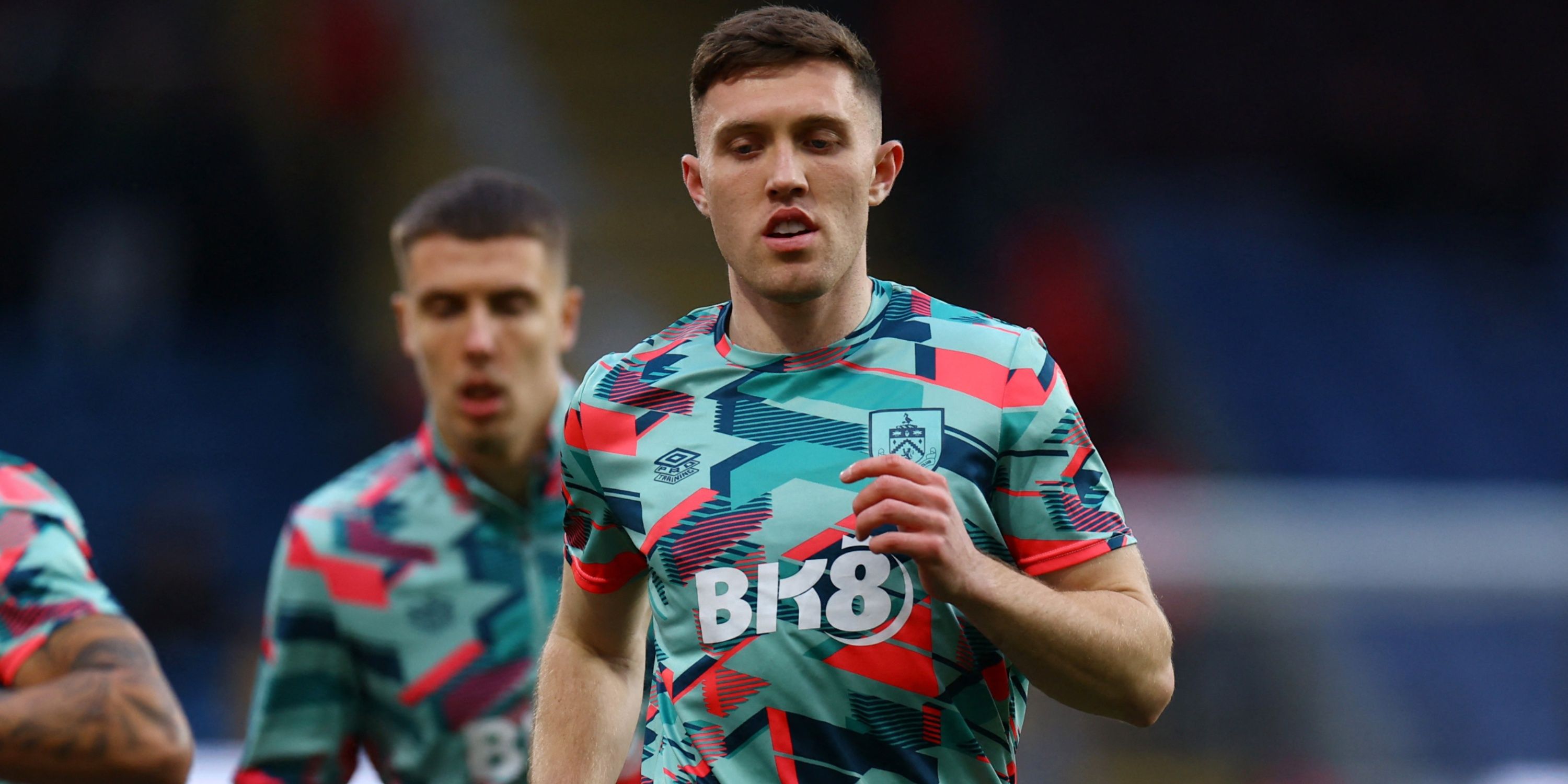 Burnley defender Dara O'Shea warms up