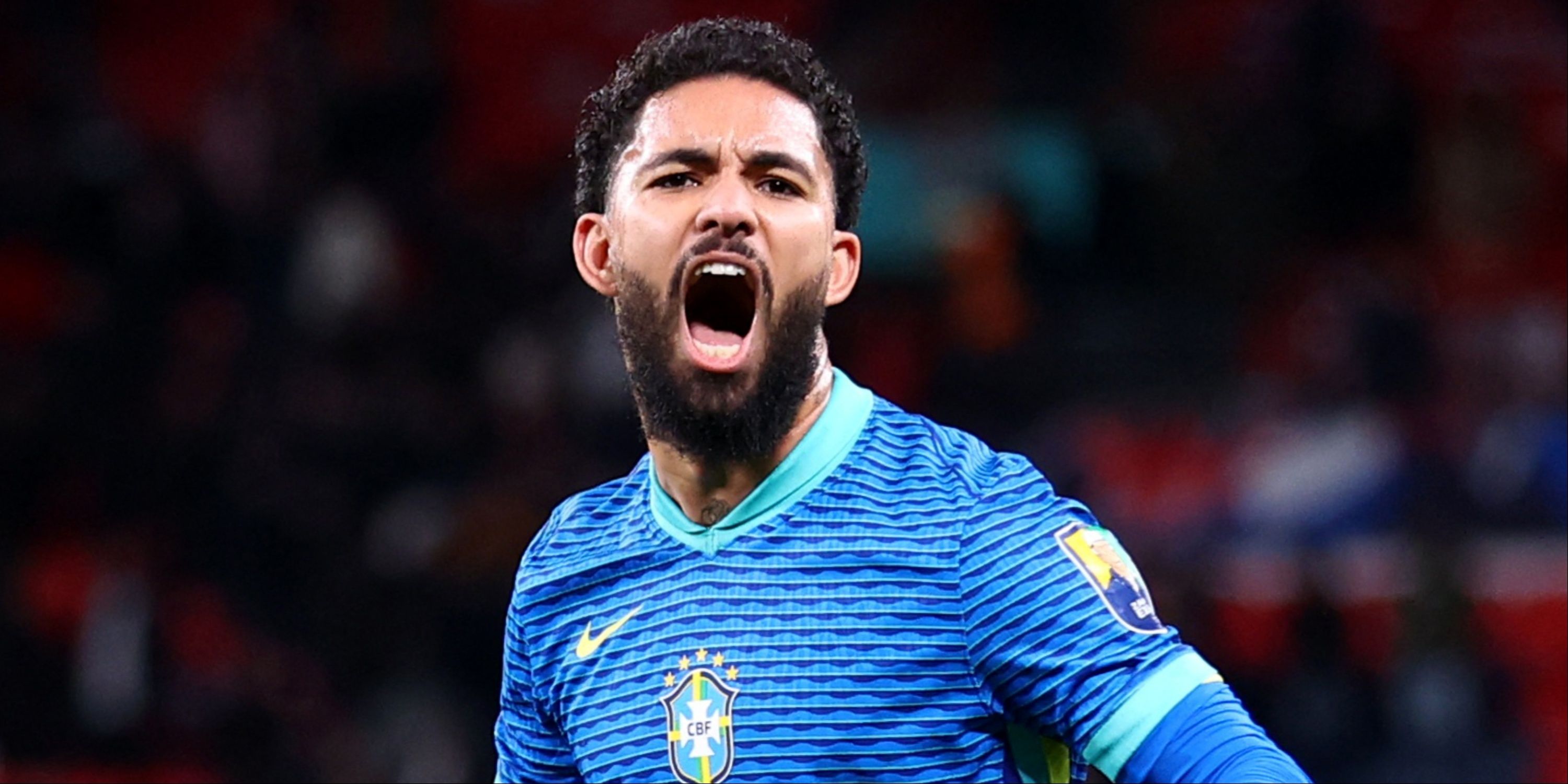 Douglas Luiz in action for Brazil