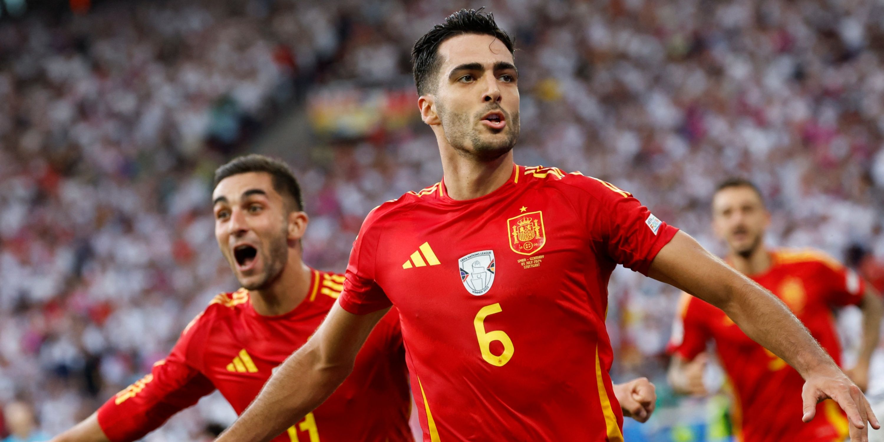 Spain midfielder Mikel Merino celebrating